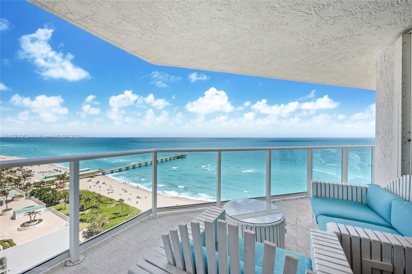 This stunning direct oceanfront residence boasts over 2,020 interior square feet and 374 square feet of open, wrap-around balcony.  The spacious open floor plan, complete with built in bar, will give you, your family and friends endless hours of peaceful enjoyment.   Timeless classic Saturnia marble floors, smooth plaster ceilings and architectural details make this home move-in ready.  The Oceania community features an amazing health club & spa, full service private beach club, fitness classes, racquetball, 2 oceanfront dining rooms, tennis, marina and more!  Truly a rare opportunity.