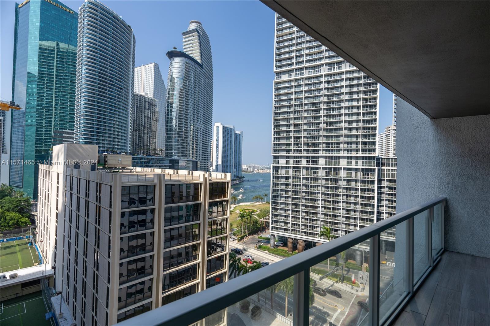 Bright 2/2 Condo in iconic 500 Brickell East Tower with stunning views: ocean, pool, or Brickell City Skyline. Features 2 large bedrooms with motorized blackout shades, privacy shades on all windows, and ample storage including walk-in closets. The apartment comes partially furnished: Master Bedroom with King Bed, night tables, and 50” TV. Living Room includes a dining table, bench, large 3-seat couch with chaise lounge, and a recliner. Equipped with top-notch stainless steel appliances, coffee machine, new microwave, UV-light treated AC for clean air, smart thermostat, and smart lights. Includes monthly cleaning service, water, Internet, Cable TV, and parking. Amenities: 2 pools, gym, spa, EV chargers, theater, club rooms, massage room, sunset room, valet.