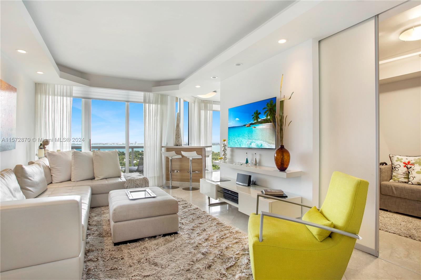 Beautifully renovated one-bedroom, two-full-bath condo, complete with a  den that is used  as a second bedroom. The unit features marble flooring throughout and is elegantly furnished, ready for immediate move-in. Step out onto the expansive terrace and be greeted by breathtaking views of the Miami skyline, Bay, and Intracoastal. Available for an annual lease, this residence offers a luxurious living experience. The building itself boasts superb amenities, enhancing your lifestyle with every comfort and convenience at your fingertips.