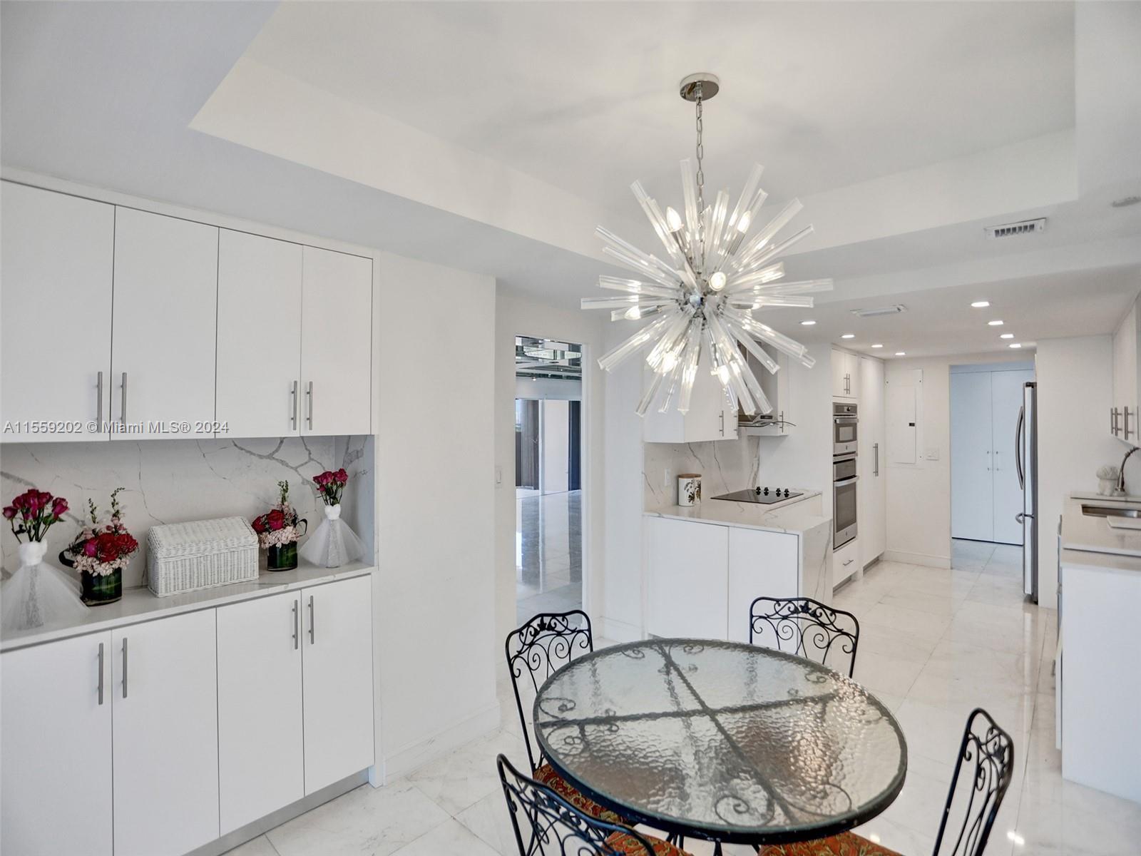 Eat-in kitchen wit LOTS of cabinet space!
