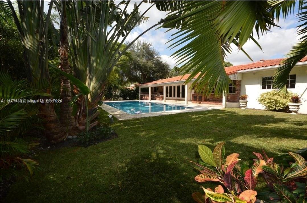 Located in the heart of Coral Gables, this lovely house offers a warm and inviting atmosphere that you'll be proud to call your own. This house is perfect for families or individuals looking for a long-term home. As you enter, you are greeted by the living room with large windows that beams natural light to flood the room and beautiful decorative ceiling beams. The kitchen is fully updated with professional appliances and a large island inviting you to create amazing moments with food. The home offers 3 bathrooms, four comfortable bedrooms, an office studio with it's own bathroom. Outside, you'll find a peaceful pool surrounded by lush greenery, creating a tranquil setting. 3 STUDENTS MAX ZERO tolerance for loudness & house parties. Deposit will vary due to this option.