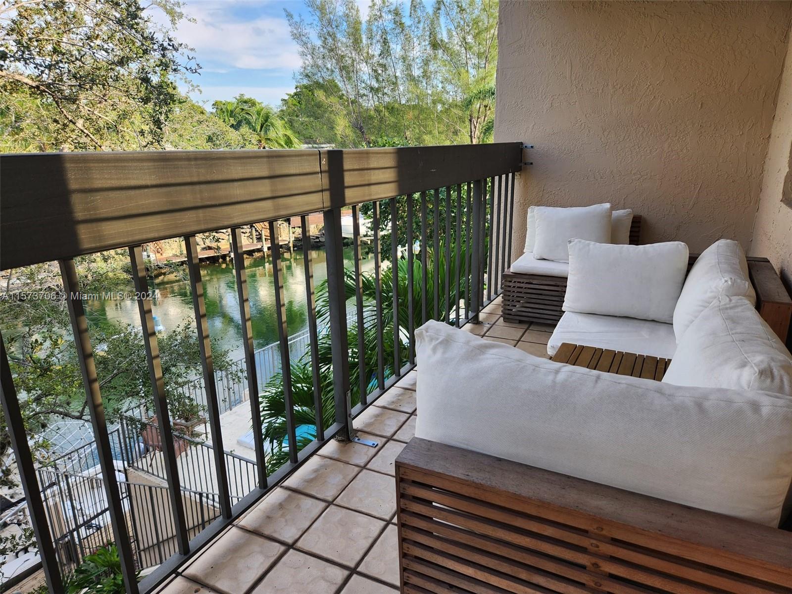 Hidden gem on the Coral Gables waterway! Enjoy lush landscaping and amazing canal views from your private balcony, lots of natural light and vaulted ceilings. This remodeled unit with s/s appliances, newer a/c, quartz counter tops, newer in unit washer/dryer is located east of US1and has picturesque waterside pool and meeting room. Easy access to US1, University of Miami, Merrick Park and Metrorail. No Students