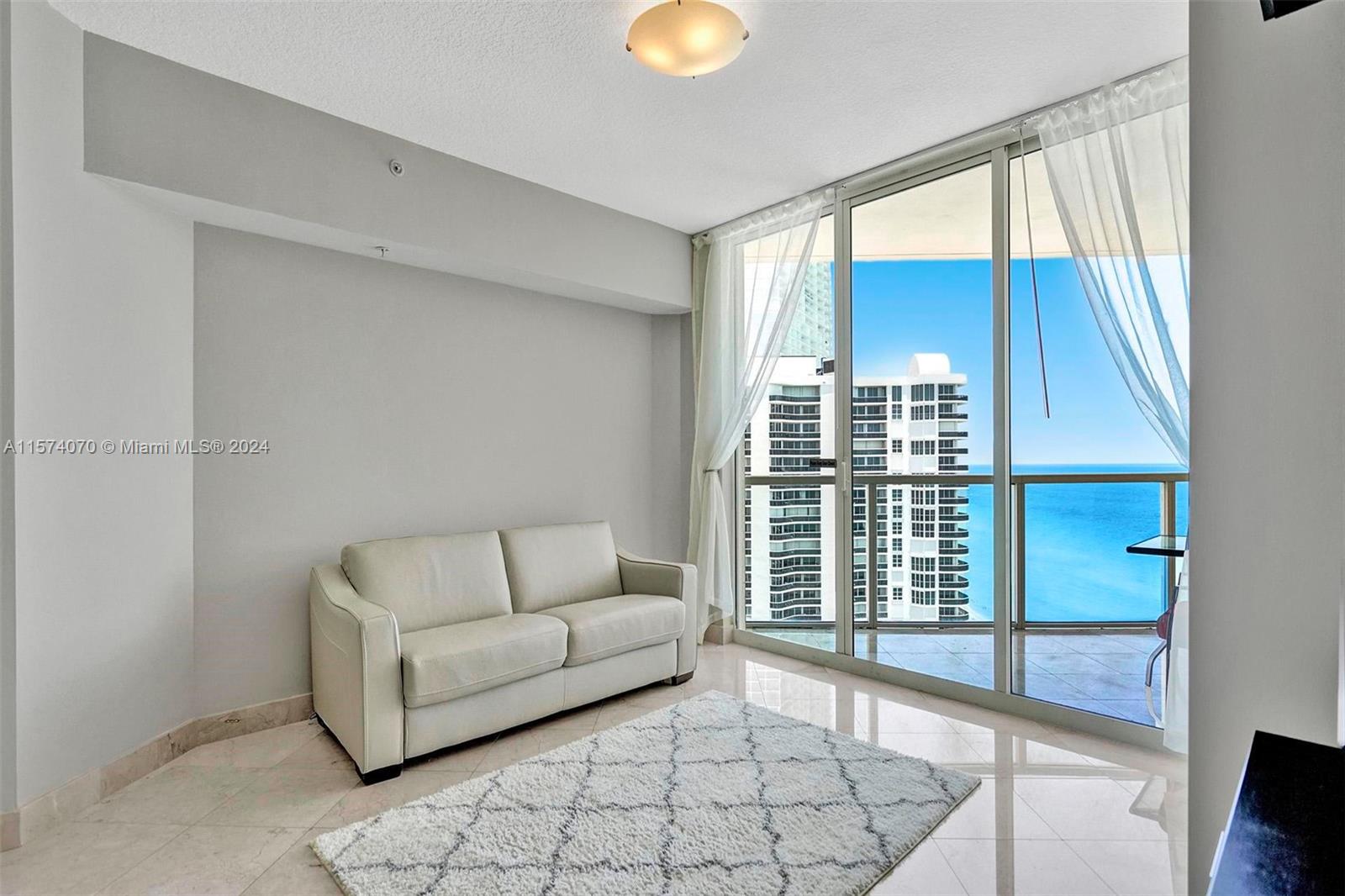 Furnished & spacious, #2405 offers an affordable long-term rental option with high floor ocean & city views that inspire. Inside, you'll find quality marble throughout, custom doors & fixtures, powder room & breakfast nook. Residents here love the fact of having the ocean below, but also the conveniences of this location. The Pier and restaurant are an amazing place to entertain - parking (valet), pool, gym, billiards, meeting rooms and many new friends await here at La Perla Ocean Residences.