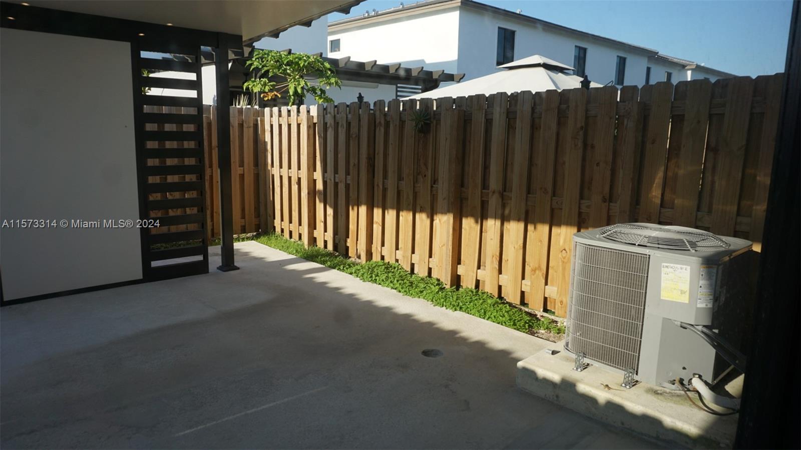 Gazebo covered patio and A/C unit