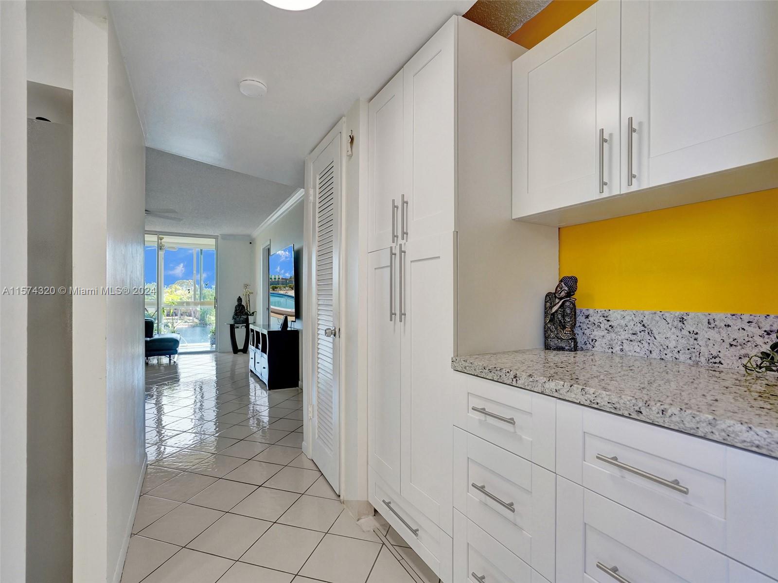 New cabinetry matches kitchen.