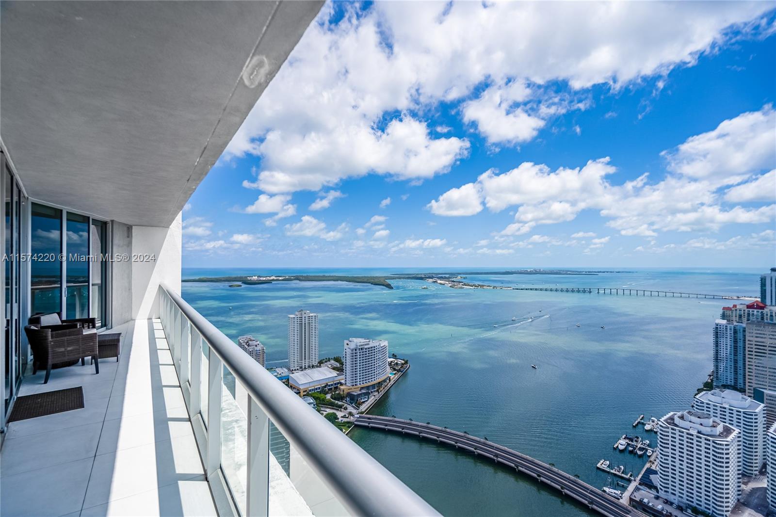 This stunning 2-bedroom plus den condo on the 54th floor offers a breathtaking panorama of the bay and the vibrant Brickell skyline. With 1,450 square feet of expansive living space and floor-to-ceiling windows with open kitchen and porcelain tile floor. Designed by renowned firm Arquitectonica and interiors inspired by Philippe. 5 Star amenities including, 2 pools, Spa, Gym, Valet, 24 hour Concierge, smart building technology and much more. Fantastic location by Brickell City Center, Mary Brickell Village, Whole Foods, train station, restaurants, shopping, arts and entertainment. Assigned parking and pet friendly. OK to lease 1st year - Rental period is 6 months minimum as per condo rules - 1 assigned parking space is included