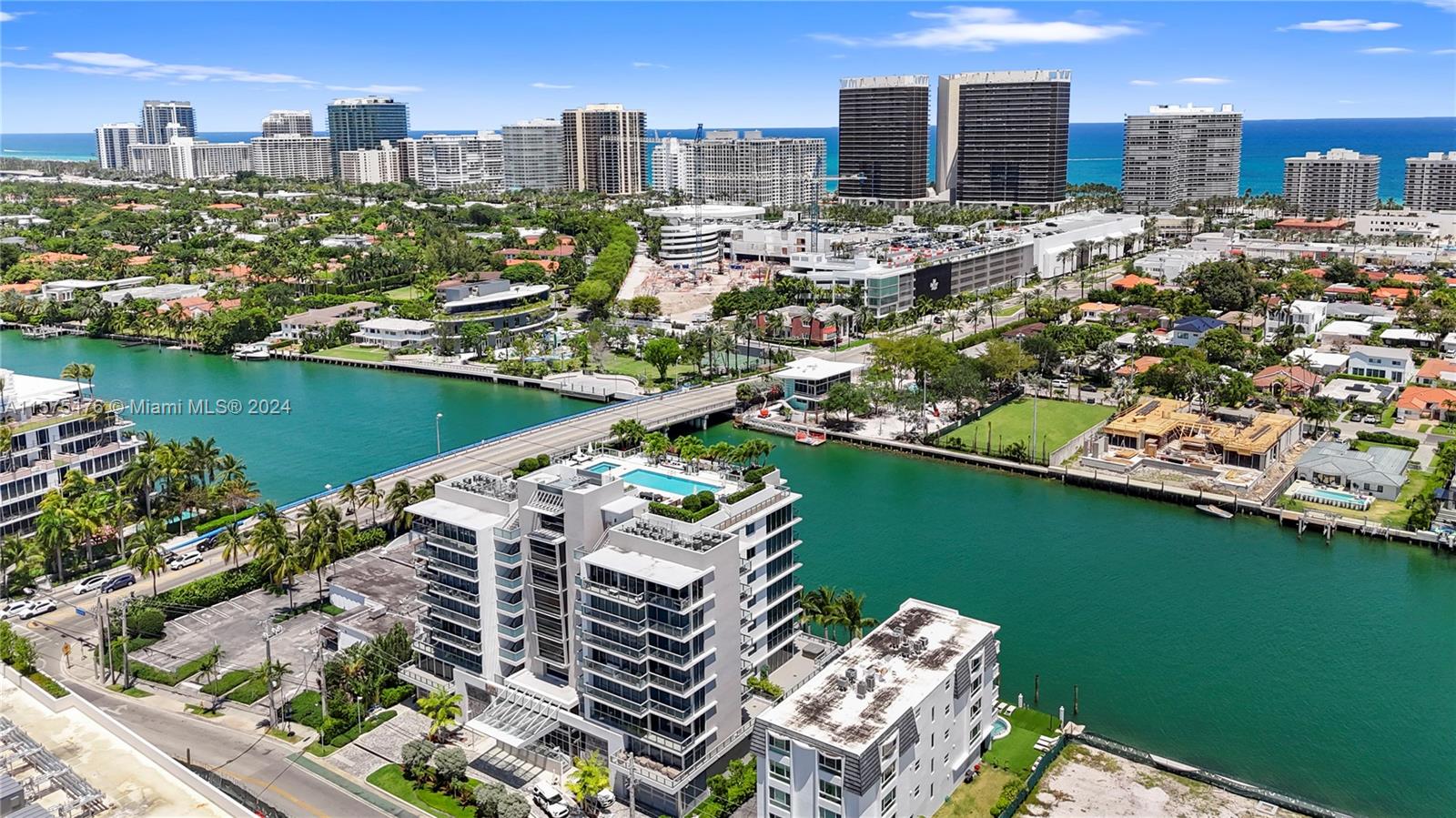 Discover luxury living at Bijou, a boutique waterfront condo built in 2021, nestled in a prime area of Bay Harbor Islands within a short distance of the exclusive Bal Harbor Shops, world-class restaurants, and serene beaches of the Atlantic Ocean. This 2-bed/2-bath residence features floor-to-ceiling impact windows providing an abundance of natural light, 2 balconies with ample outdoor space, Subzero and Wolf appliances inside Mia Cucina Kitchen, an elegant wood panel wall with timeless charm, 2 parking spaces, and a spacious storage unit. Indulge in stunning views of the ocean, Intracoastal, and the city skyline from the rooftop pool terrace, or entertain guests in the relaxing clubroom with access to the private boat docks. Other building amenities include gym, 24-hr security and valet.