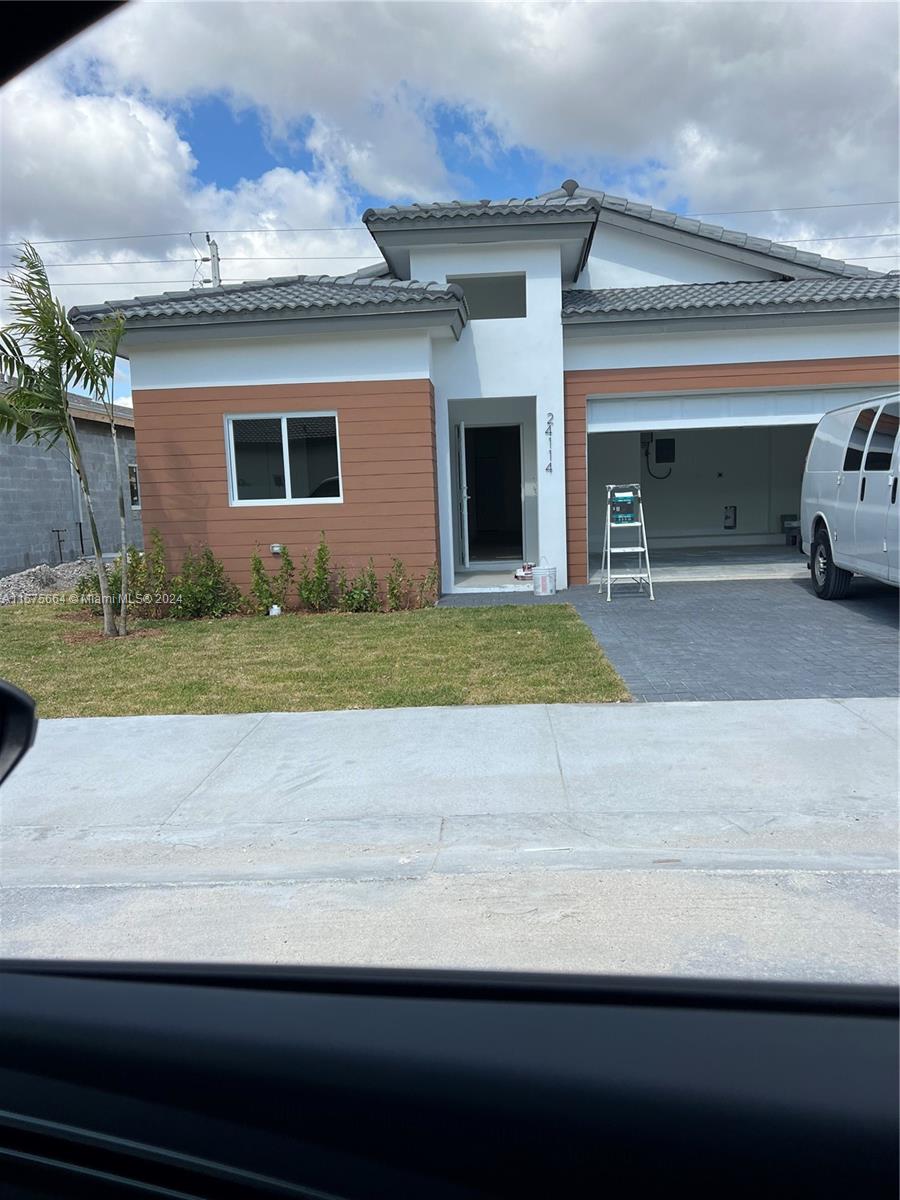 NEW CONSTRUCTION, 4/2 TWO CAR GARAGE.