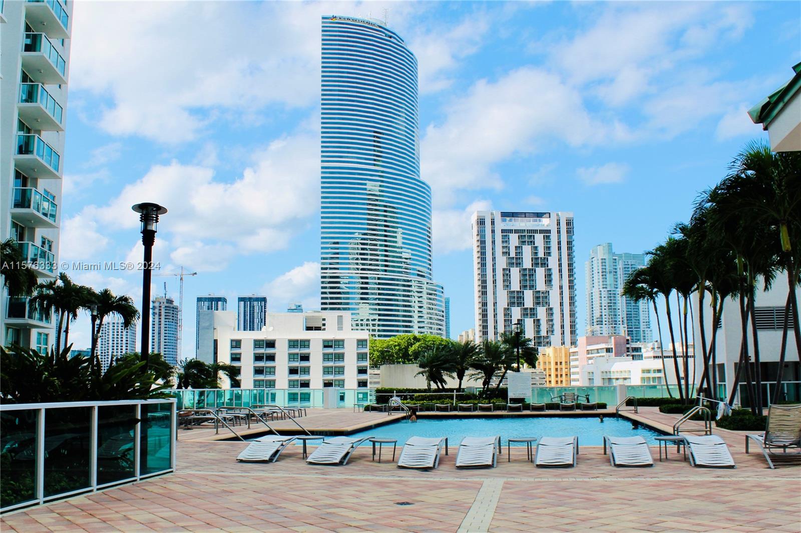 Experience urban living in the Heart of Brickell in this spacious and bright 1-bedroom condominium, perfectly located just 2 blocks from the bustling Brickell City Center, offering unmatched access to premier dining, shopping, and entertainment. Airy and bright ambiance full of natural light, sleek polished concrete floors that offer a contemporary feel, and accent walls in kitchen and living room. The open floor plan flows onto a serene balcony, overseeing the Miami River, perfect for morning coffees or evening relaxation.
The building offers a three-story fitness center, men’s and women’s spas, 2 sparkling swimming pools, 24-hour security, clubroom and a business center. One assigned parking space and washer & dryer inside the unit.