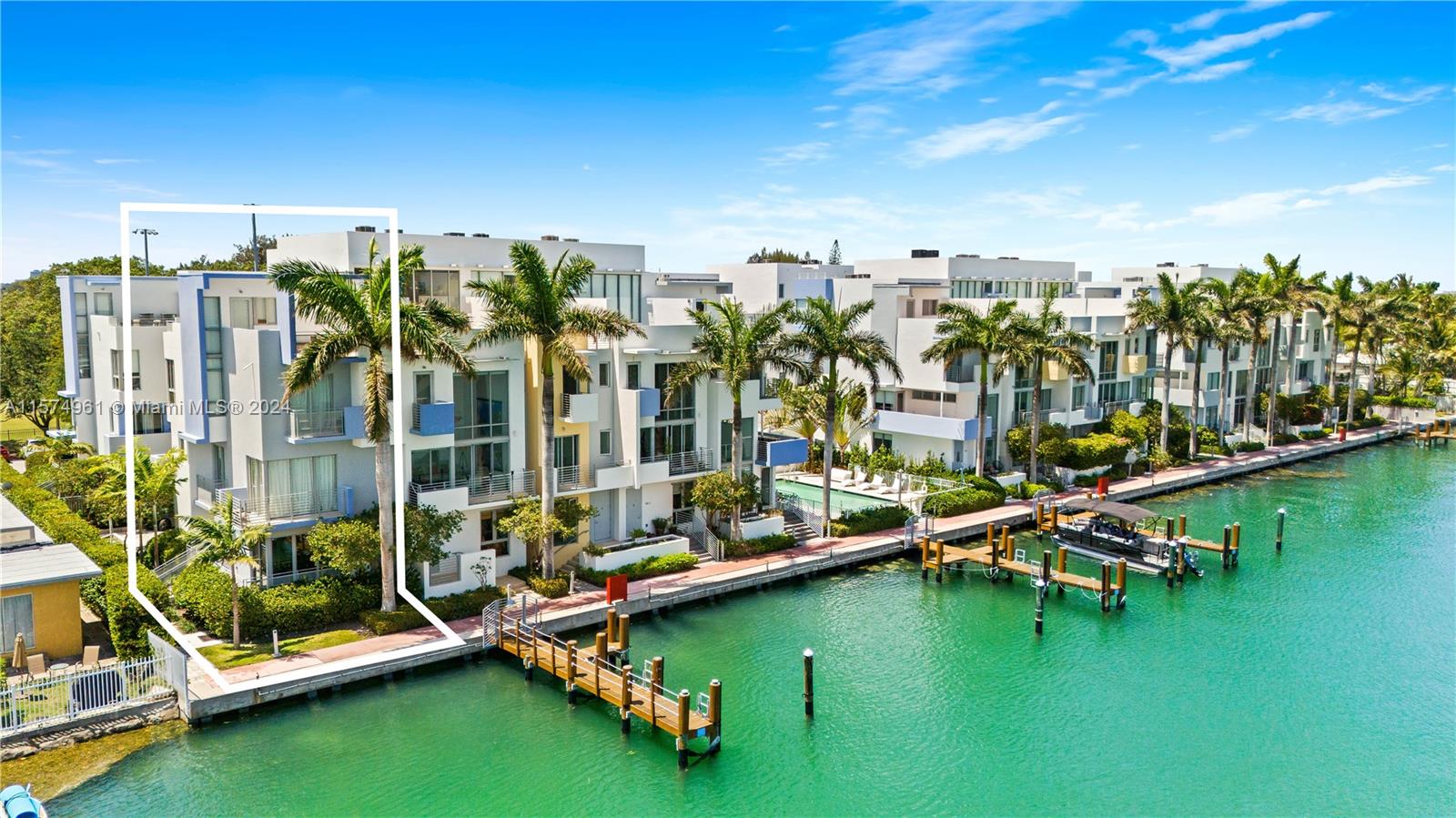 Indulge in waterfront luxury with this elegant 3Bed/3.5Bath townhouse corner unit + rooftop terrace. Located directly adjacent to the prestigious Normandy Shores Golf Course and Fairway Park, this corner unit offers light-filled interiors, an open kitchen concept and captivating water views from all three levels. Multiple balconies and a stunning rooftop terrace seamlessly blend indoor and outdoor living. Enhanced by a pool and a community boat dock, this residence is designed for those who appreciate the Bayfront lifestyle. This home is equipped with impact windows and a top-notch alarm system. The complex offers 24/7 gated security with camera surveillance for your peace of mind. Ocean access is only a few minutes down the road, making this home a perfect retreat for water enthusiasts.