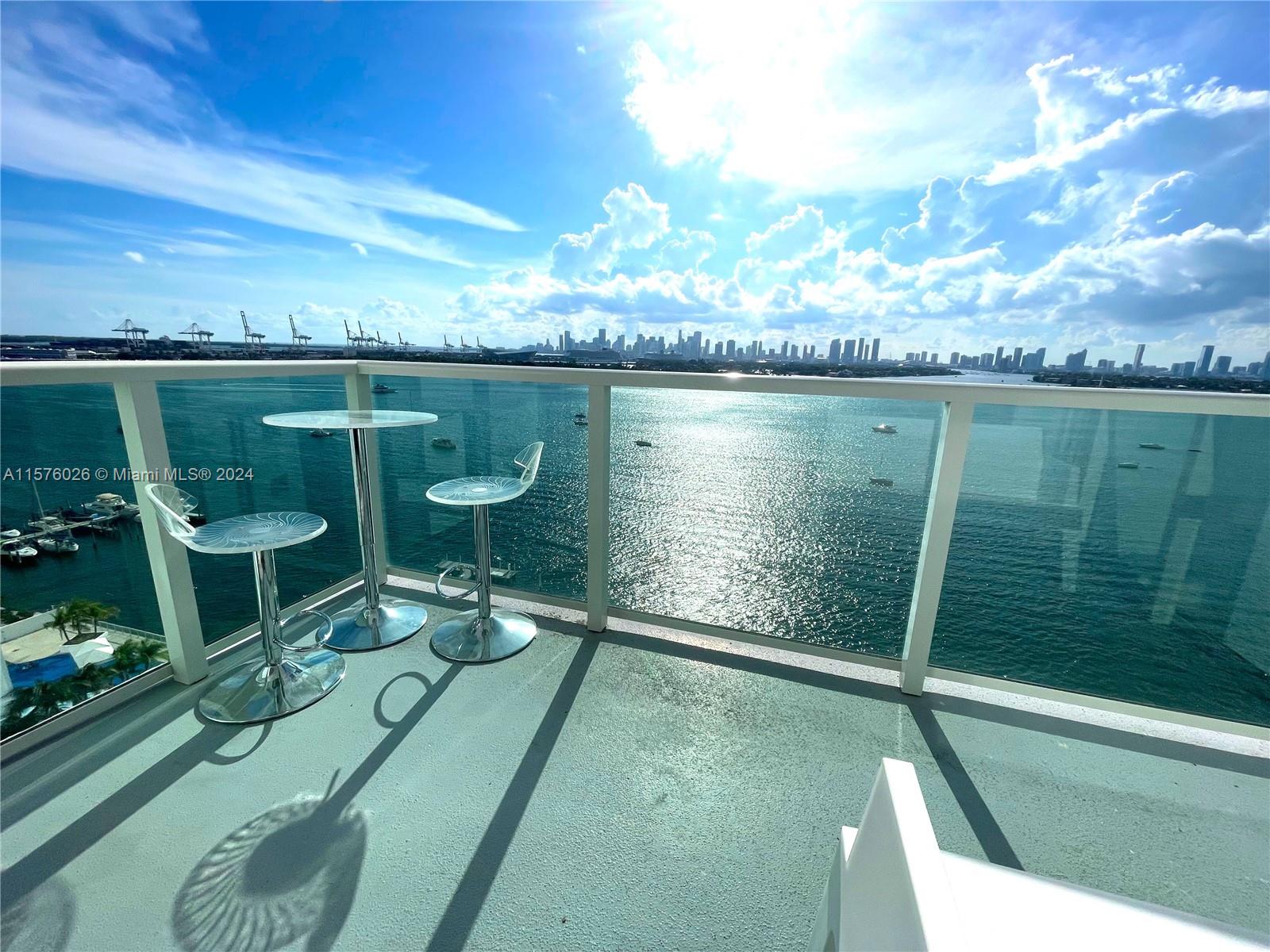 Spectacular Bay views from this Stunning 2/2 corner unit fully remodeled with w/high-end materials and equipment: mother-of-pearl stones, marble floors, Viking appliances. Fully equipped with the finest high-style furniture. Enjoy al fresco cocktails & dining while enjoying magnificent sunset views. Rent includes water, High Speed internet, HD cable. Additional Amenities; 24-hour valet parking, 5,000-square-foot fitness center, sauna, 24-hour security, convenience store, beauty salon. Also, next to Whole foods, within a short walk from FLAMINGO PARK (Pool, Bark Park, Running Track, Tennis, Playground...), Trader's Joe, Publix Supermarket & shops. Short drive away from Downtown, Arts & Entertainment District, Bayside Marketplace, Brickell. Lease for minimum 6 months up to one year.