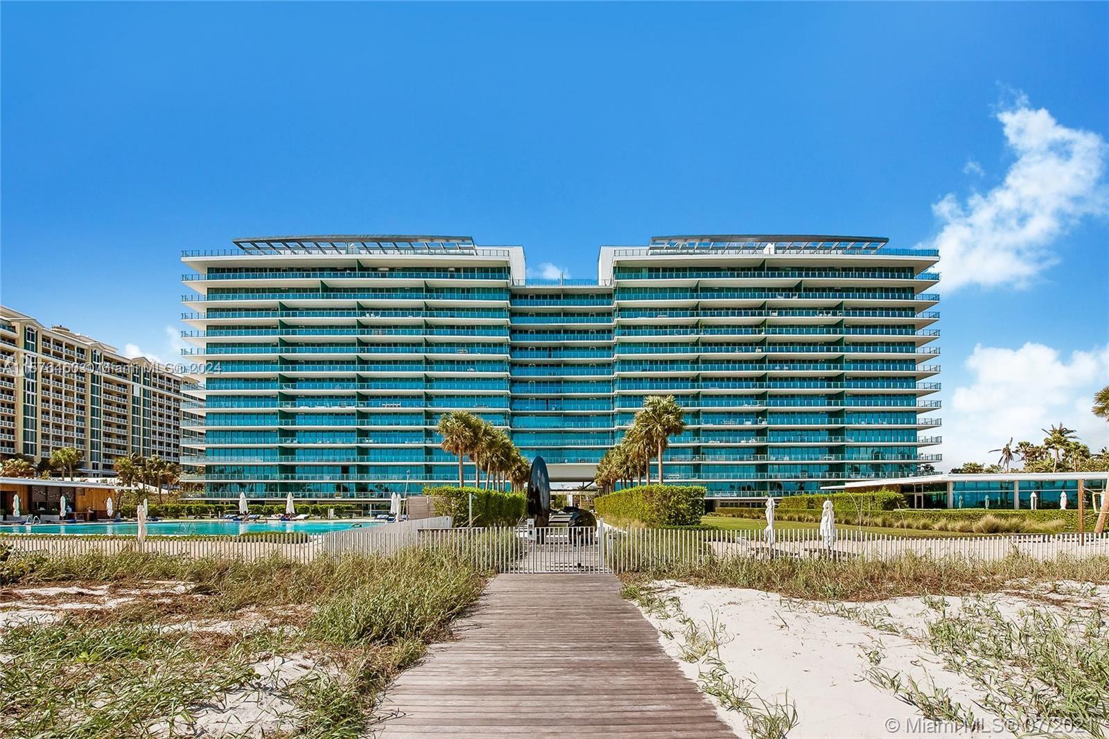 Introducing an exquisite 4-bedroom 6 and ½ bath corner unit in Oceana Key Biscayne. Discover its breathtaking beauty, from the state-of-the-art kitchen with sleek stainless-steel appliances to the spa-like bathroom flooded with natural light. Elegance extends throughout, with marble floors and hardwood bedrooms exuding opulence. Wake up to mesmerizing ocean views and enjoy the oversized wrap-around balcony for a seamless indoor-outdoor retreat. Experience luxurious living at its finest in this exceptional residence, boasting remarkable aesthetics, lavish features, and unmatched vistas. Building amenities include: Relaxation Pool & Lap Pool, Beachside services, Tennis Court, Ocean-view Fitness Center, Spa treatments, Putting Green, 24-hour Concierge.