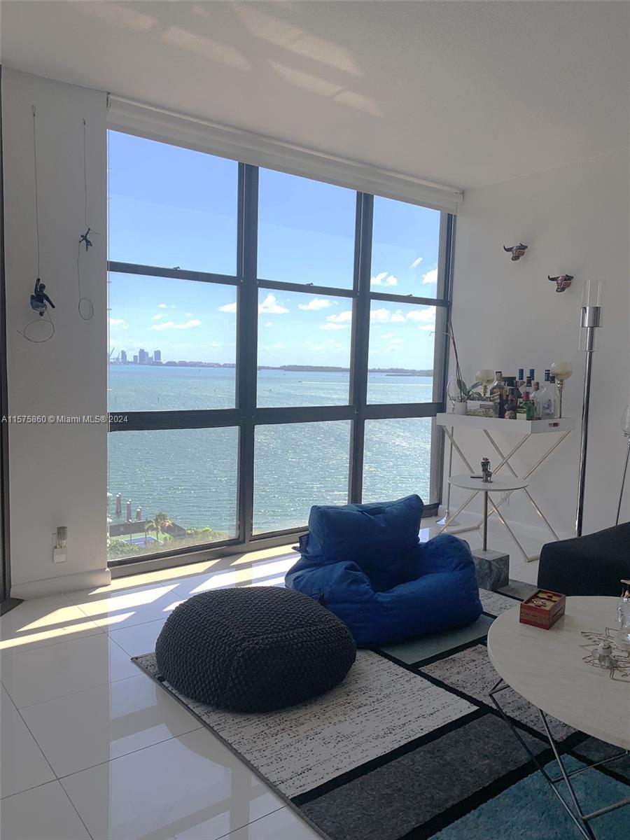 Magnificent recently remodeled 2/2 (1,064 sq. ft.) condo in desirable Brickell Place.
Unit features a conveniently converted 2nd bedroom/den with 2 full bathrooms! An over-sized
balcony with sweeping views of Biscayne Bay, Port of Miami and Downtown Brickell. New
kitchen features SS appliances, granite countertops with built-in bar area and wine chiller. Washer & dryer in unit
plus 1 covered parking + a storage unit. Building amenities include: 2 pools, gym, sauna, six
tennis/pickle ball courts, also racket & squash courts, coffee shop, bbq area, basic cable, water
& more! Steps away from work, shops & restaurants. Trolley can get you around Brickell,
Downtown and Coconut Grove.