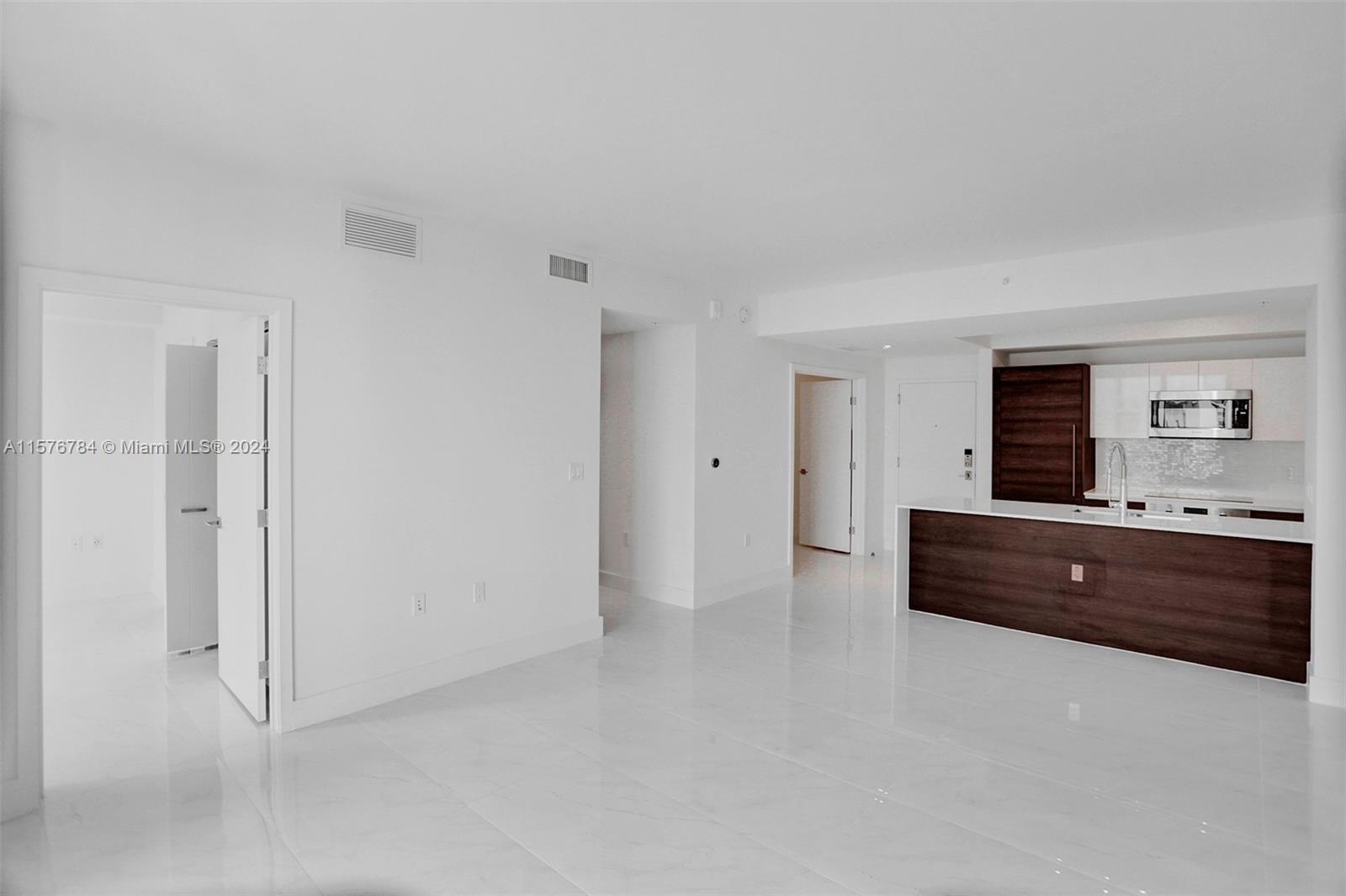 AVAILABLE NOW. SPACIOUS 1 BD+DEN/1 BA UNIT WITH GREAT VIEWS. Live in the premier new development of Merrick Manor with gorgeous views of the parks and Coral Gables! This Mediterranean villa-style residence is located in a heart of Coral Gables. This unit features walk-in closet, built-in Bosch appliances, white quartz countertops, spacious bathroom, and washer & dryer in the unit. Unit comes with 1 assigned garage parking space. Merrick Manor is conveniently located just steps from the fashionable shops of Merrick Park and a school right across the street. Merrick Manor offers a variety of amenities that include a big pool, gym, recreation room, media room, BBQ, and a 24-hr concierge. Pet friendly.