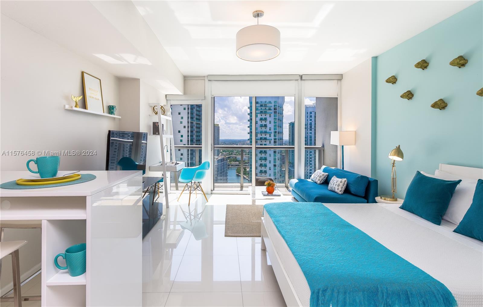 AIRBNB, no restrictions. On a high story, with floor-to-ceiling glass walls, this Icon Brickell Residence offers stunning city and river views with the bay in the background. Refined furniture and complements, and a fully equipped kitchen. It includes Bosch dishwasher, full-size washer/dryer, HD Smart LED TVs (100+ channels), plus web streaming), free fast Wi-Fi, Italian cabinets, and premium appliances by Wolf & Subzero, as well as solid marble counters. 
The luxurious Icon Brickell resort in Miami was designed by Philippe Starck, with dramatic views on Biscayne B