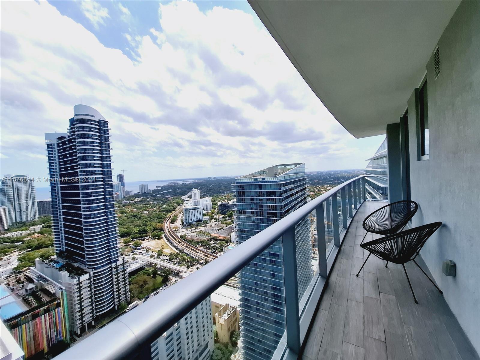 This is truly living in the vibrant heart of Brickell. Enjoy breathtaking panoramic city and water views from above in this fully-furnished 2 bedroom 2 bathroom corner unit within the prestigious Millecento building, designed by the renowned Ferrari designer Pininfarina. This signature building created by the prominent architect Carlos Ott, includes staggering-designed amenities with two swimming pools, including a Miami-worthy rooftop pool, pool-deck and playroom, a spacious clubhouse with pool table & library, movie theatre, gym, spa, meeting room & an on-site self-checkout mini store. Every corner around this neighborhood radiates exclusivity by a unique subtropical-urban lifestyle, filled with culinary delights, from bakeries to top-rated restaurants & bars, shops and boutique stores.