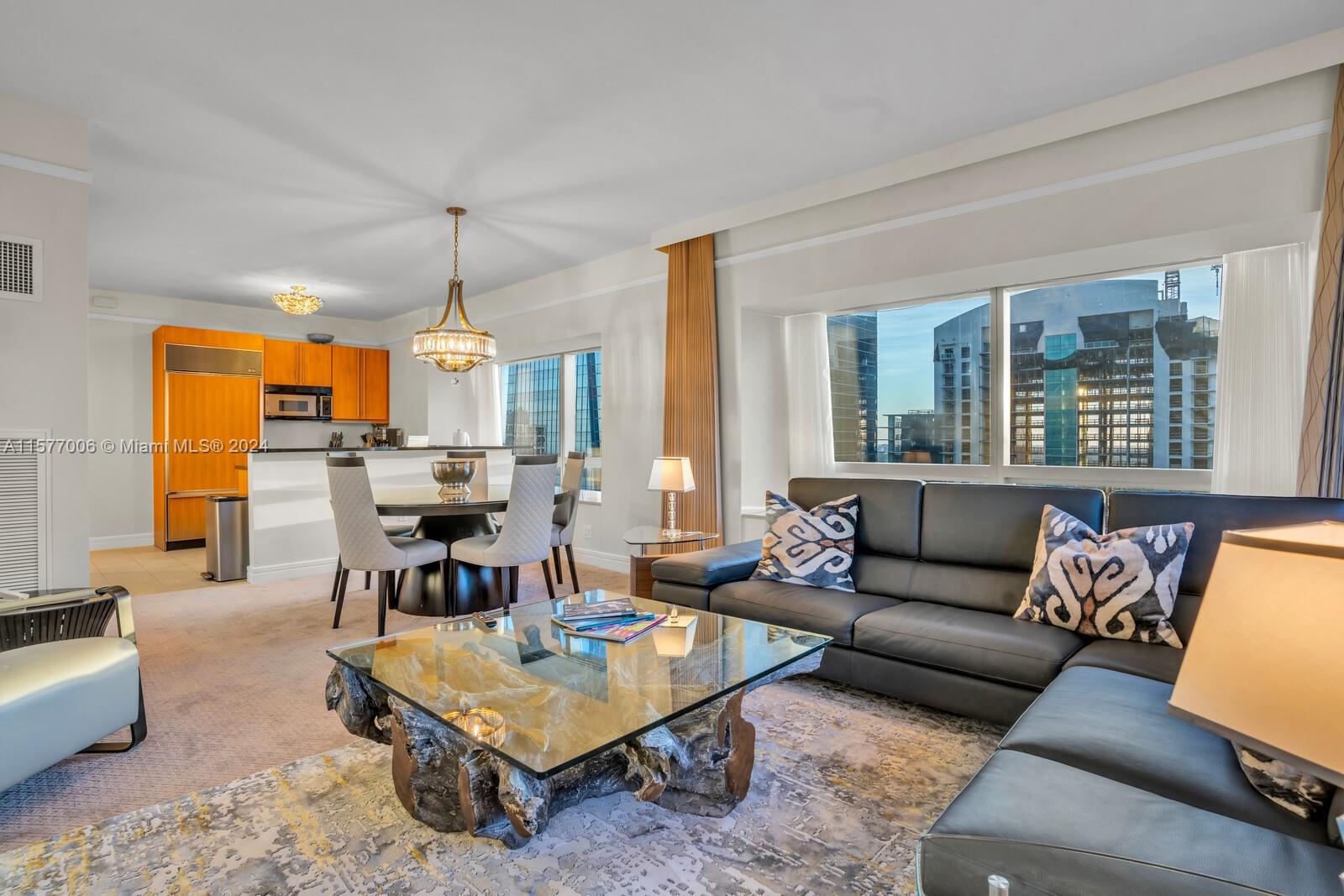 Luxurious sold fully furnished 2-bed, 2.5-bath unit at the 5-star Four Seasons hotel Brickell with breathtaking views. Features wood cabinetry, stainless steel appliances, and granite countertops in the full kitchen. Includes walk-in closets, full-size washer/dryer, storage unit, 1 parking space, and valet service. No rental restrictions—ideal for VRBO, Airbnb, or direct rentals. Enjoy world-class services amenities like Equinox gym, resort-style pools, spa, and dining options and 24-hour concierge. Conveniently located in Brickell, offering both comfort and luxury. Experience the hotel lifestyle or rent it out while away.  Great investment property. Easy to show. Call listing agent for appointment. All info on MLS is deemed to be true but not verify Owner financing available.