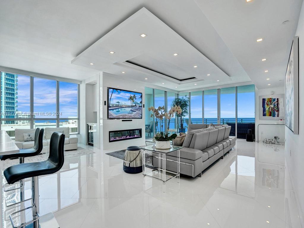 Wow! Perfect 10! Enter from Private Elevator Foyer A Spectacular Newly Renovated Modern Furnished Residence In Luxurious Oceanfront Boutique Diplomat Residences Best Direct Ocean/Intracoastal/City Views! Throughout This White Light 3 bed/3.5 bath Smart Home Flow Through Split Plan & 2 Terraces. Finest Finishes w/ No Expense Spared &Nothing Original Remains. White Glass Floors, Open White Gourmet Kitchen w/ White Cabinets, Wolf, Subzero, Thermador. Electric Window Treatments, New Baths, Custom Closets, Impact Glass, Sonos System, Tv In Mirrors, Anima Domus Murphy Bed. 5 Star Amenities incl Pool, Beach Service, Game Room, Theater, Sauna, Gym, Conference Room, & More. Enjoy The Resort Style Living & Services Of The Diplomat Hotel Next Door w/ 4 Restaurants [eat at 15% off] & More!