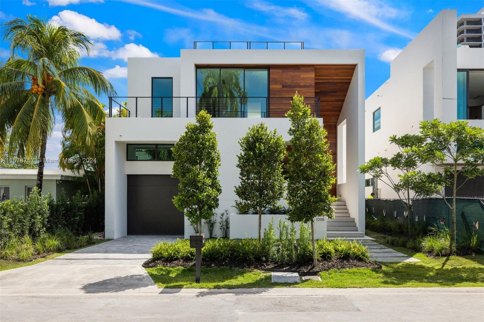New Construction - Just Completed and Staged in a highly sought-after area, Venetian Islands. This home has over 6,400 Total SF with 5BR/5.5BA designed by Jose Sanchez - Praxis Architecture. The open floor plan connects the living area, family room, and Italian chef’s kitchen with exterior summer kitchen designed perfectly for entertainment. This home as well features top of the line Gaggenau appliances, smart home technology, swimming pool, master suite with large walk-in closet and terrace, climate controlled wine cellar with racks, rooftop terrace with 360 degree views + summer kitchen, and many more. Amazing opportunity to live on a dead-end street in the Venetian Islands. This home is in walking distance to Sunset Harbor, Lincoln Road, Miami Beach Golf Course, Beach, and much more.