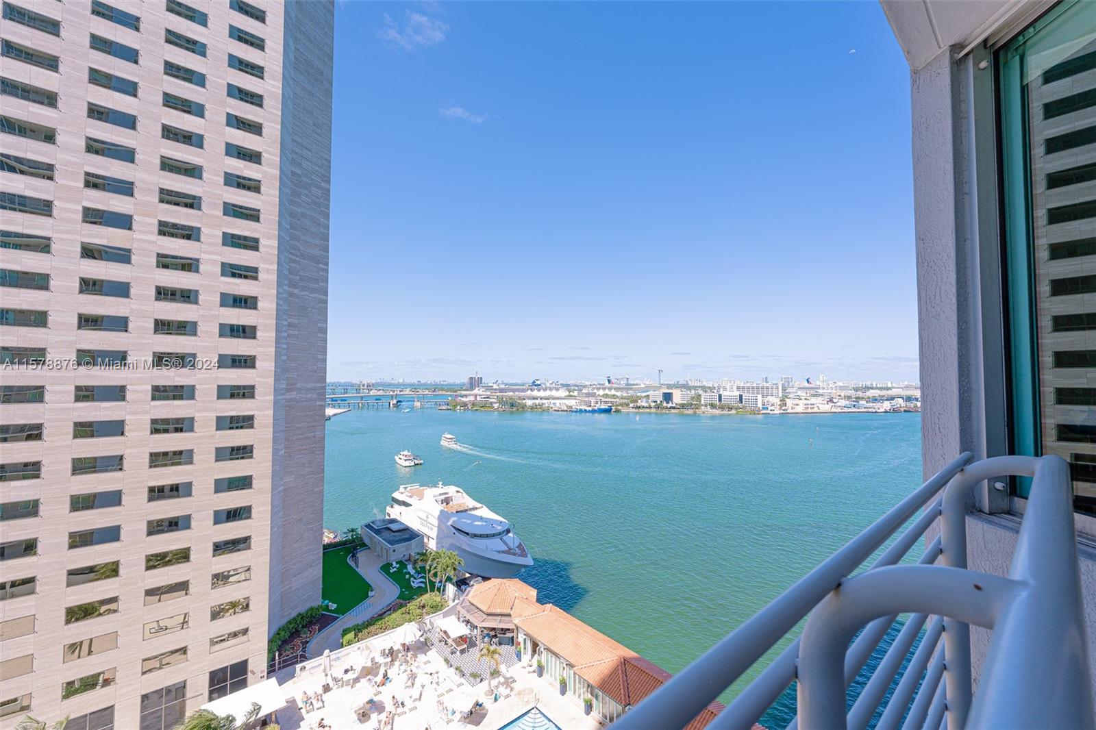 Beautiful 2 bedrooms 2 baths split plan condo overlooking Biscayne Bay and Port of Miami. Condo has with Wood kitchen cabinets with granite countertops backsplash and stainless steel appliances and marble countertop bath. 2 walk-in closets with window treatments throughout. Bldg amenities includes: 2 swimming pools, Jacuzzi, 2 Fitness Centers, 2 Party Rooms, Conference Room, Convenience Store, and 24 Hours Valet, Concierge, and Security. Centrally located within minutes to SoBe, Grove, Gables, Design District and Airport.