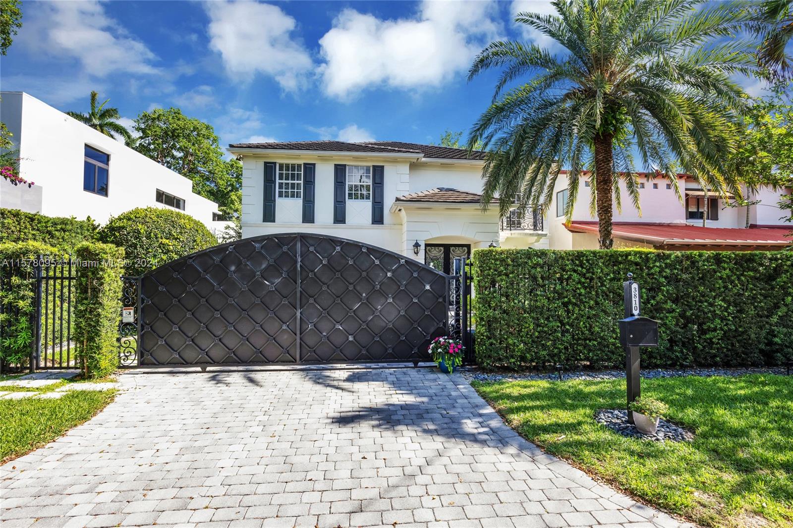Exquisite, ultra-private gated retreat in prestigious South Coconut Grove. Enter into light-filled living spaces w/ volume ceilings and marble & wood flooring throughout. Stunning, updated kitchen features European style cabinetry, new Sub Zero & KitchenAid appliances + island & breakfast bar.  2nd level primary suite offers dual walk-in closets, office/gym space, balcony overlooking the lush grounds and a spa-like bath w/glass enclosed shower & soaking tub. Enjoy resort style outdoor living on the covered terrace & relax in the heated pool, surrounded by a magnificent tropical garden. Full-home generator & Smart Home systems. Furnishings negotiable. Walk to the Grove village’s boutiques, cafes, best private schools and bayfront parks & marinas. Minutes to downtown, MIA & the Beaches.