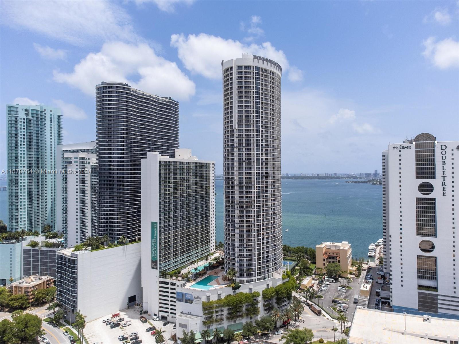 Beautifully furnished 1 bedroom condo at Opera Tower! Enjoy the Miami skyline and partial bay views from your wall-to-wall balcony! Ceramic floor, floor-to-ceiling sliding glass doors, & walk-in closet. Amenities include newly renovated pool and gym, 2 Jacuzzis, business center, clubroom & media room, BBQ area, 24-hr security/lobby & assigned/covered garage. Opera Tower also has a convenience store, dry cleaners, hair salon, & restaurant on its ground floor. Live across from beautiful Margaret Pace Park w/walking path, soccer fields, tennis & volleyball courts. Walk to Publix, Miami Trolley, local trendy restaurants, shops, museums, galleries & concerts. Minutes to Midtown, Wynwood, Brickell, Design District & Miami Beaches! 30-day short-term rentals allowed, 12 times a year.