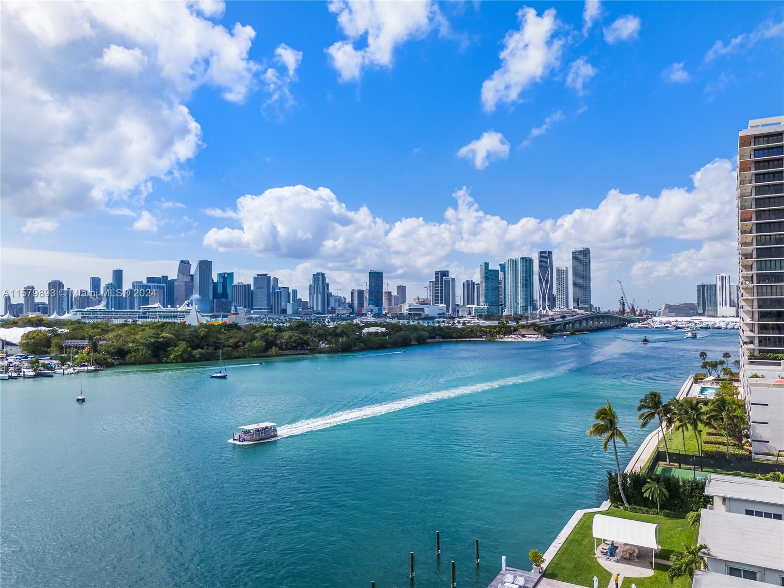 Own a piece of The Venetian Islands; Miami's most centric location in between Miami/Biscayne Blvd. & Miami Beach, surrounded only by water and million dollar homes. Assigned Paddle-board/Kayak storage available. Not even the million dollar homes have these city views! Watch the cruise ships, Jet Skis and the party boats pass by from your balcony porch or enjoy the salt water heated pool all year round. Bathroom, Impact windows are brand new. Newly Installed Impact Windows. Storage Unit included on the ground floor.