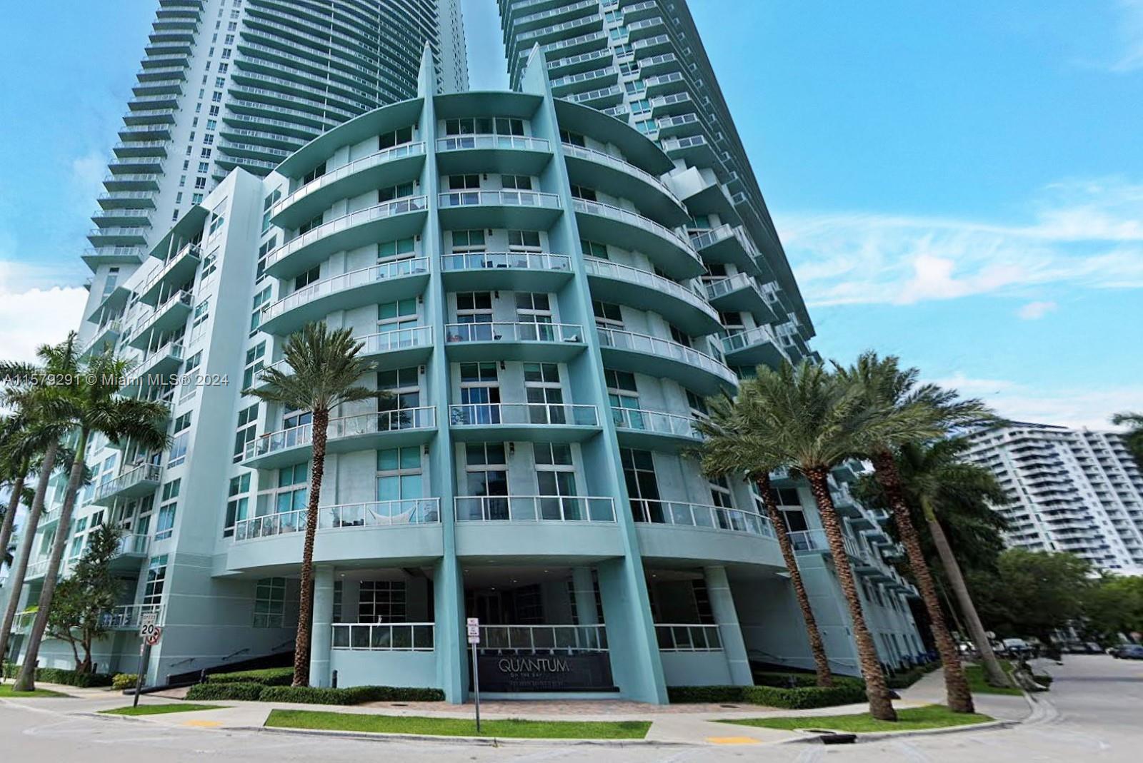 Fantastic opportunity for this corner unit in the sought-after Quantum on the Bay! Indulge in stunning views of Biscayne Bay and the Miami Skyline from this high-floor gem boasting a wrap-around balcony. Inside, discover a modern kitchen adorned with European cabinets, quartz countertops, and stainless steel appliances. The layout includes 2 bedrooms and 2 baths, plus a versatile den perfect as a 3rd bedroom or office. It is fully upgraded. Enjoy the perks of a full-service building with free cable and Wi-Fi, security, a doorman, a pool attendant, 2 pools, and top-notch amenities like a gym, valet, business center, convenience store, and more. It is conveniently located near Downtown, Wynwood, Brickell, and beaches. Ideal urban living awaits!