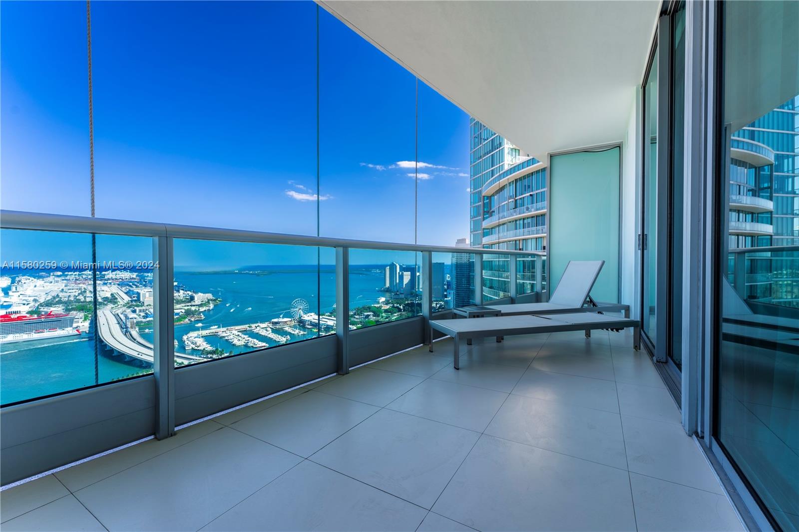 Turn key residence with unobstructed ocean & bay Views in the heart of Miami. Upgrades and Features include guest "murphy" bed, floor to ceiling windows, automatic blinds, high end furniture, SubZero and Miele appliances, small kitchen appliances & utensils. 900 Biscayne offers central location next to Museum Park, Concert arena, Modern Art Museum, Museum of Science, Balet, Opera as well as easy connection to Brickell, Miami Beach & the airport. Amenities include 24/7 front desk attendant, security, valet, top of the line Gym, Social rooms, Theatre, resort style Spa, Swimming pools and more.