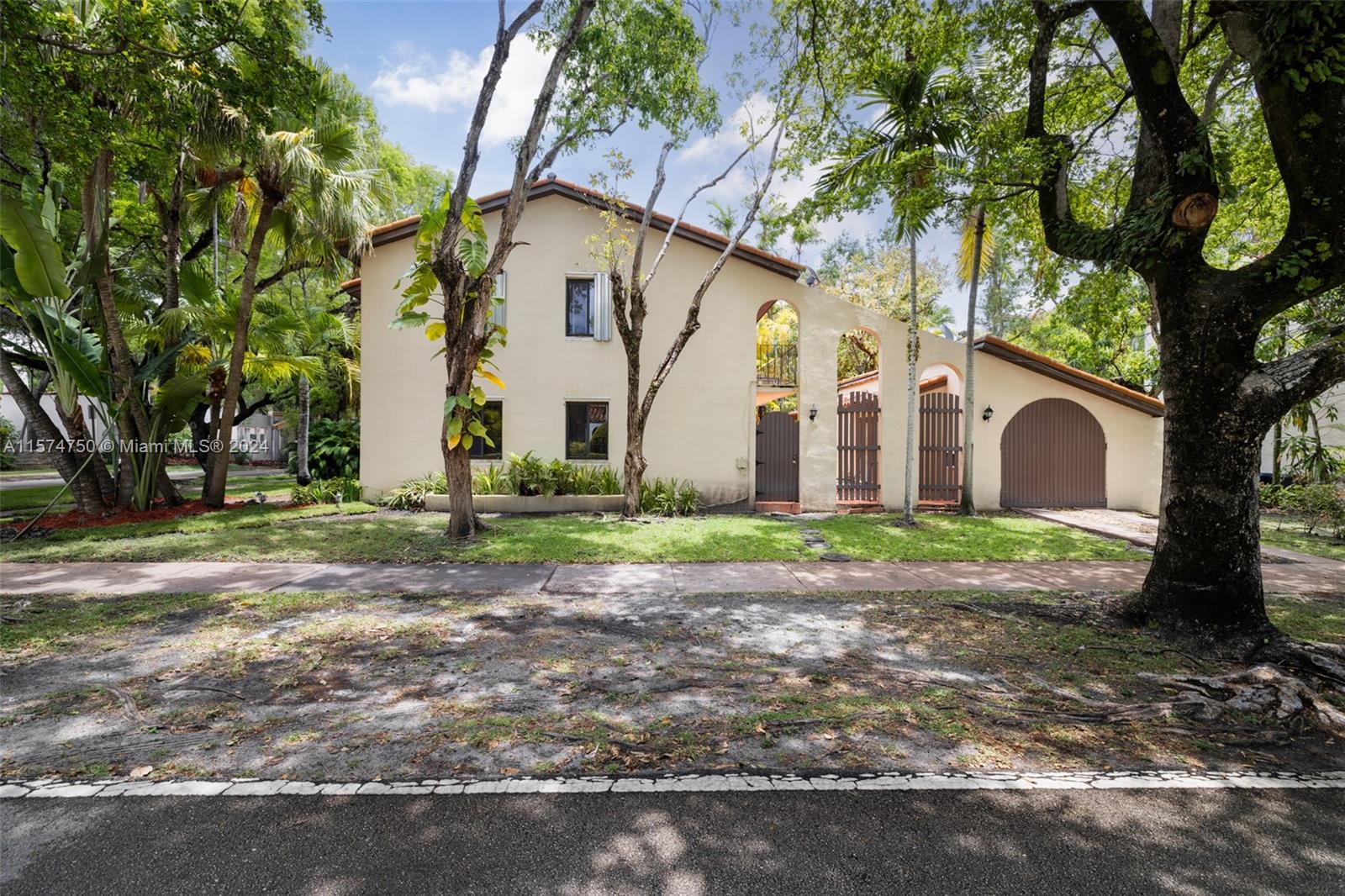 Introducing a charming 1960s home nestled in North Gables, featuring 3 bedrooms and 2 bathrooms across two stories. This cozy residence boasts an enclosed courtyard, perfect for entertaining. Situated on a corner lot, it includes a detached 1-bedroom guest house, ideal for a live-in nanny or in-laws. Updated in 2007, this home combines vintage charm with modern amenities. Conveniently located near shops, restaurants, and schools, don't miss this opportunity to own a piece of North Gables charm! Schedule your showing today.