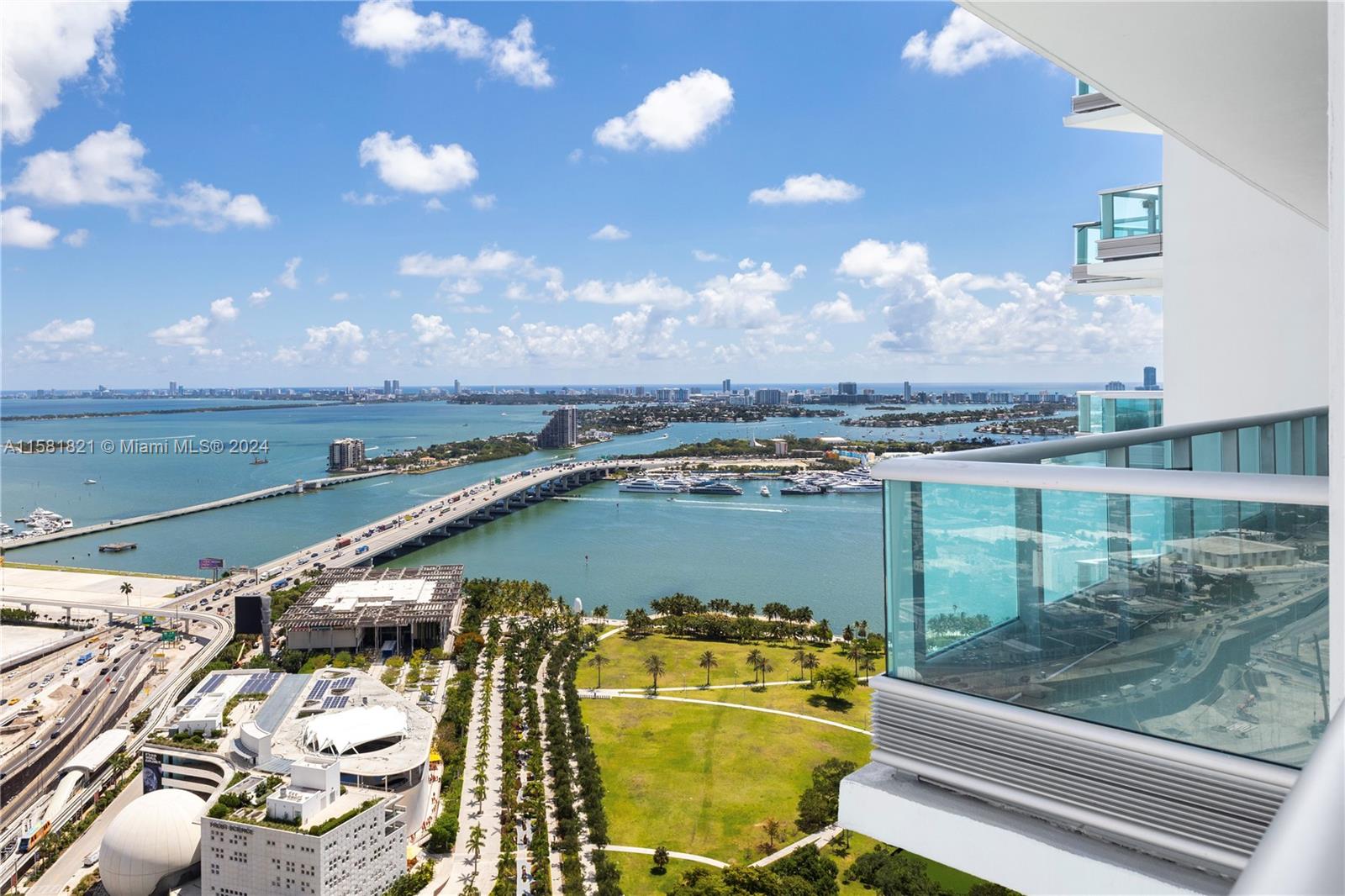 Move-in ready condo located on the 42nd floor of the prestigious 900 Biscayne in downtown. Boasting breathtaking water views, unit features tile throughout, 2 balconies, a Den that can be converted into a second bedroom with a  full bathroom next to it. Modern kitchen equipped with high-end appliances and ample storage space. The bedroom includes an ensuite bathroom, walk-in closet, and a private balcony. As a resident, indulge in a wealth of luxurious amenities, including a fitness center, 2 pools, clubhouse, conference center, billiard and TV lounge, piano bar, screening room, spa, sauna and steam room. 
Live walking distance from Miami World Center, parks, museums, Art District and Miami Heat Arena, surrounded by world-class dining, only 15 minutes from the MIA Airport and beaches.