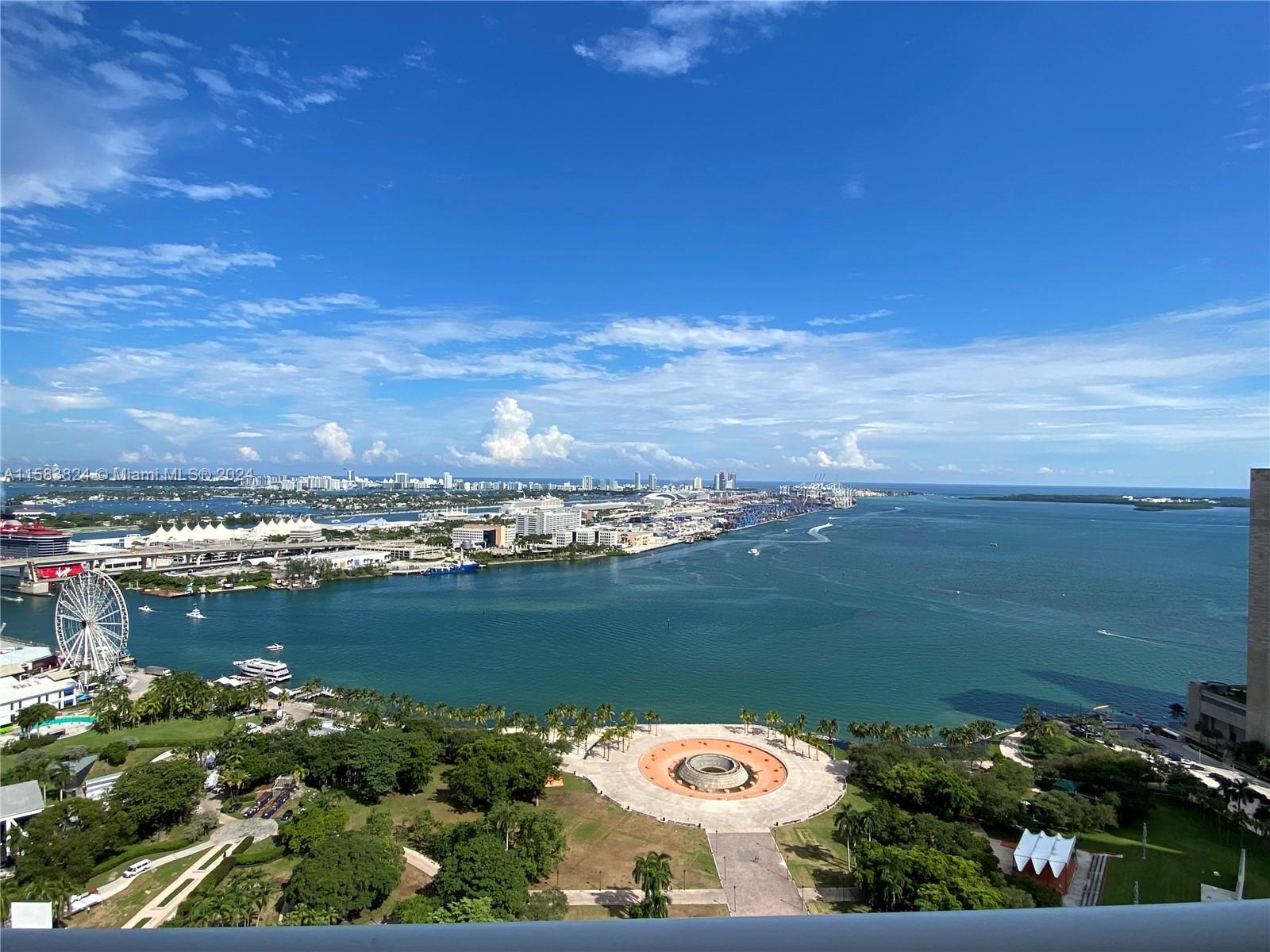 50 Biscayne Blvd. 2 beds 2 Baths plus Den (13x10). Marble floors, unit in mint condition with direct Bay Views. Rent includes basic TV Cable/ Internet, one assigned parking space, EV charging stations, water, garbage and all of the amenities. Secured Building.