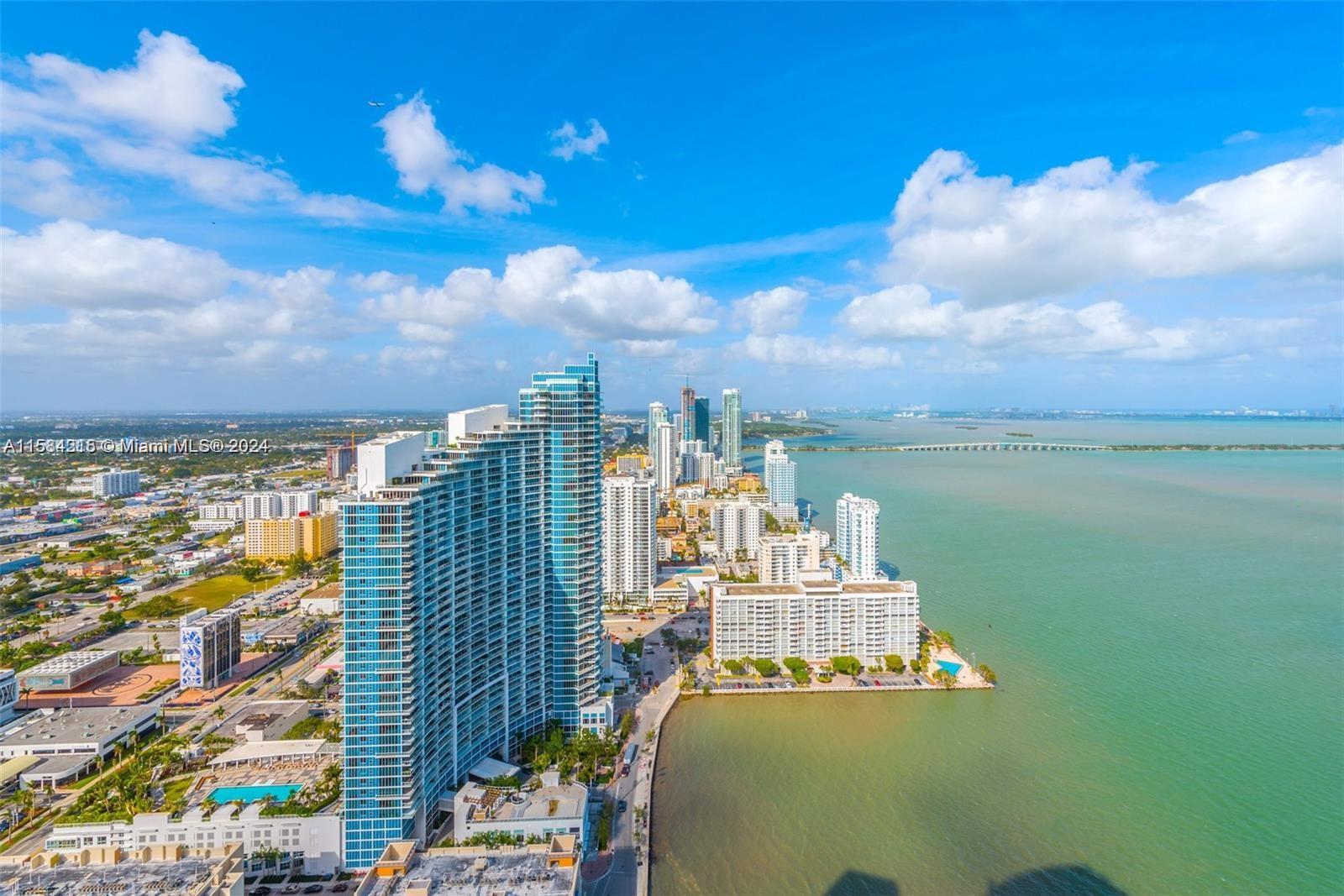 One of the finest units located on the 48th floor of Quantum on the Bay is ready for you! Enjoy amazing bay views from every room and your oversized private balcony. This 2/2 home in the sky features a recently updated kitchen w/ stainless steel appliances, granite countertops, impact windows, tile floors throughout and washer & dryer.  Building amenities include: 2 pools, private gym, theater, business room, valet, 24-hour security, mini market, full concierge & party room. Directly across from Margaret Pace Park, and minutes to Downtown, Wynwood and Design District and all main highways.  Owner will consider First & Security for qualified tenant!  Water & Wifi Included.