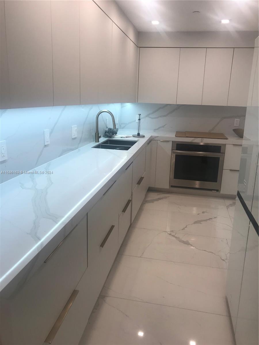 Beautiful and spacious  two bedroom apartment completely remodeled with brand new furniture !The apartment features porcelain and marble floors , 2 marble bathrooms and a small office . 
Located in the prestigious Bal Harbour the building offers 24 hours security, a gym,a pool and jacuzzi.
Wifi and cable are included in rent.
Easy to show.