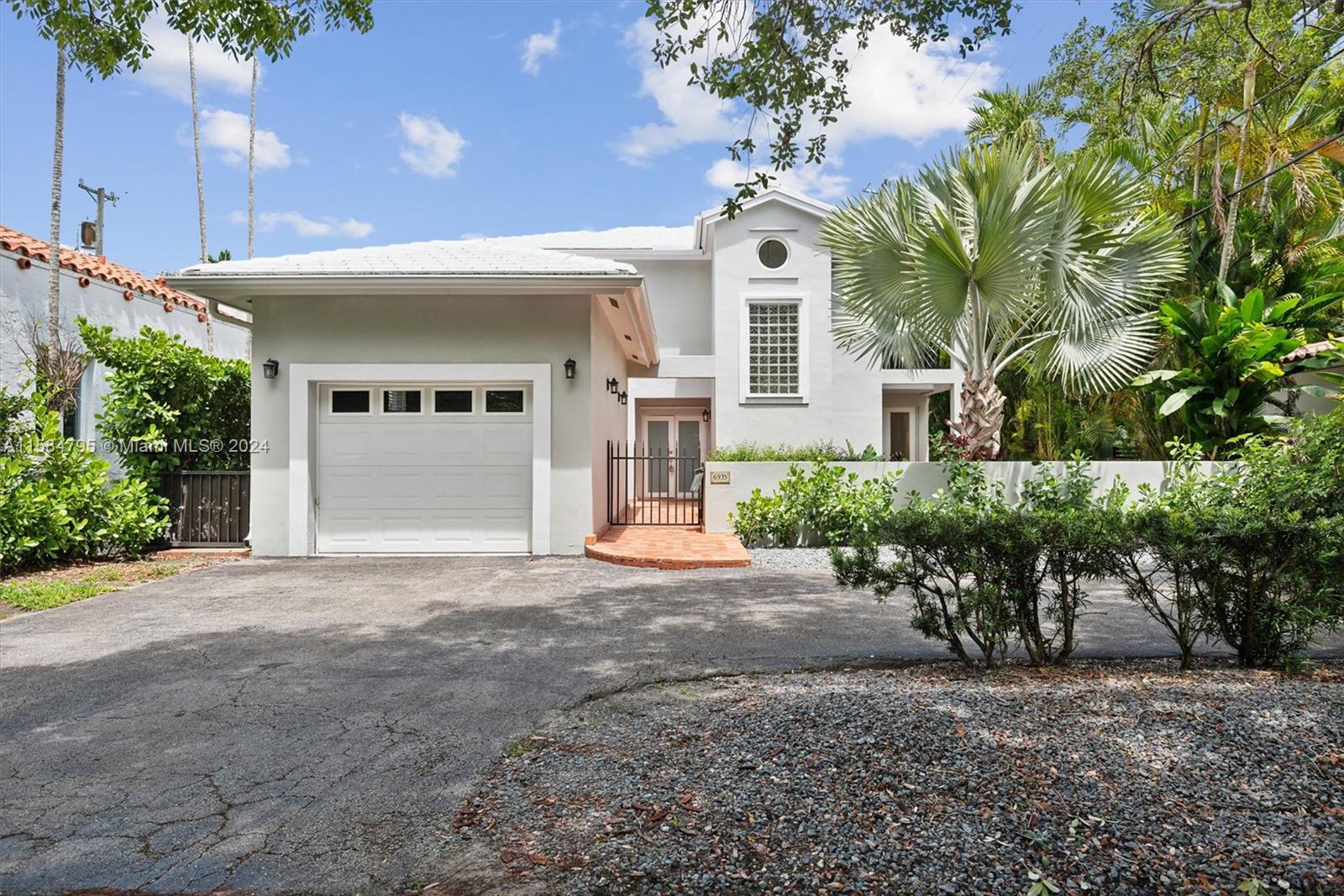 Two story bright and spacious 3 bed/2.5 bath plus 1 car garage residence located in the coveted, sought after South Gables neighborhood. Property is within the Sunset Elementary zone, a certified international multi-language magnet school. Pedestrian friendly street including dual sidewalks and luscious, mature trees. No flood zone. House features double door entrance, impact windows and doors, two new A/C units and ducts, plantation shutters throughout, porcelain and hardwood flooring. 1st floor includes a brand new kitchen with Bosch appliances, dining and family room, guest bathroom, and laundry room. 2nd floor includes three bedrooms and two full baths. Lovely forever home in an ideal location near great shops, restaurants, parks, and excellent private & public schools.