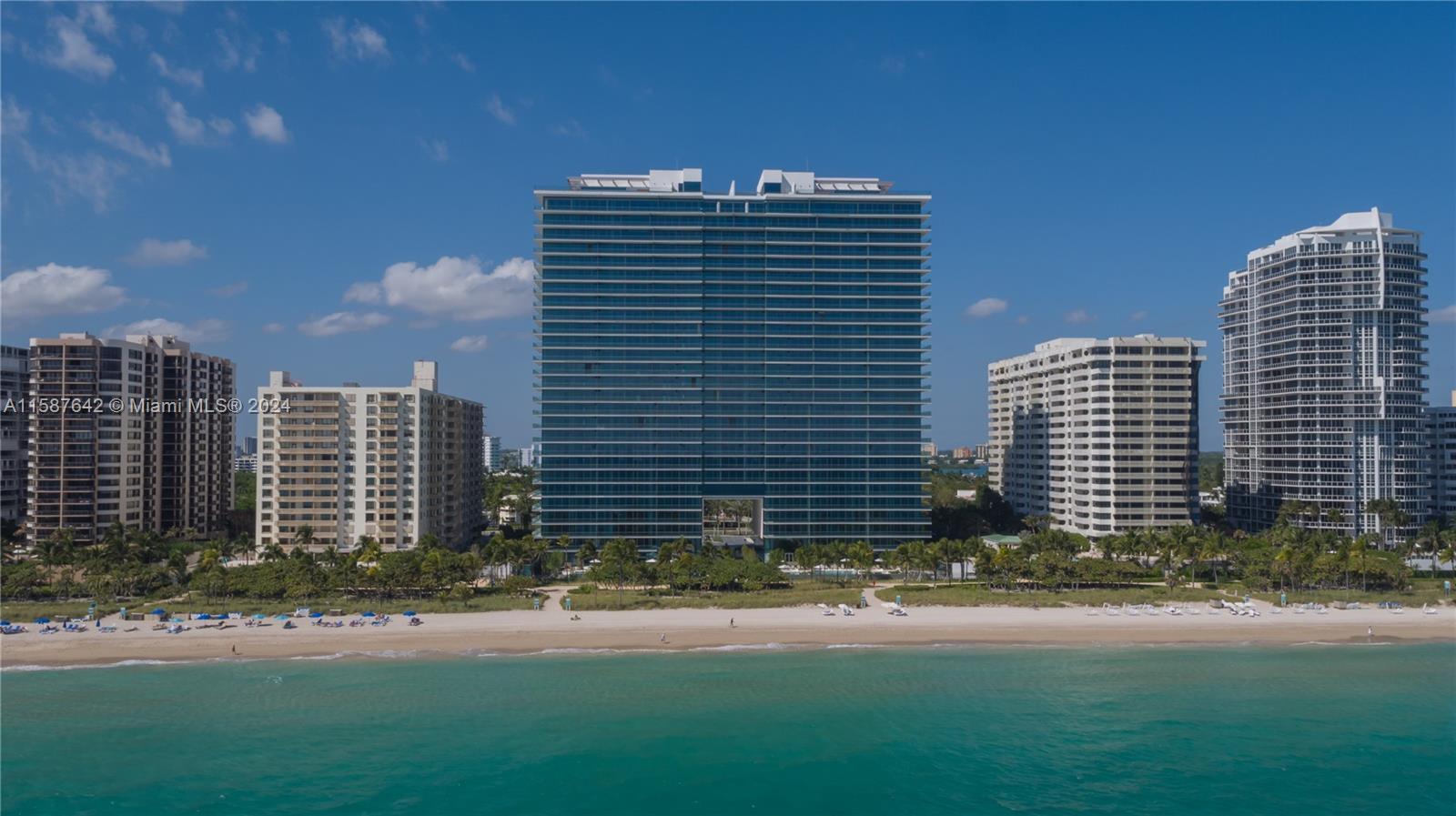 Stunning oceanfront condo (both living room AND master bedroom have direct oceanfront/palm tree views!) 1 bedroom + den (full bath, closet, Murphy bed that converts to a king or 2 twins) at the prestigious Oceana Bal Harbour. Fully furnished – just remodeled interior that includes BB Italia, Roche Bobois & Reflex Angelo furnishings, rugs from Italy, contemporary art collection, upgraded kitchen, interior doors, and roll-down shades that 'disappear', B&W sound system, & flush ceiling lighting. The kitchen features Gaggenau appliances, a coffee maker, a steam oven, a warming drawer, a wine cooler, and an induction stove. This is better than being on vacation, a MUST SEE! Oceana is one of the most beautiful buildings in the Miami area