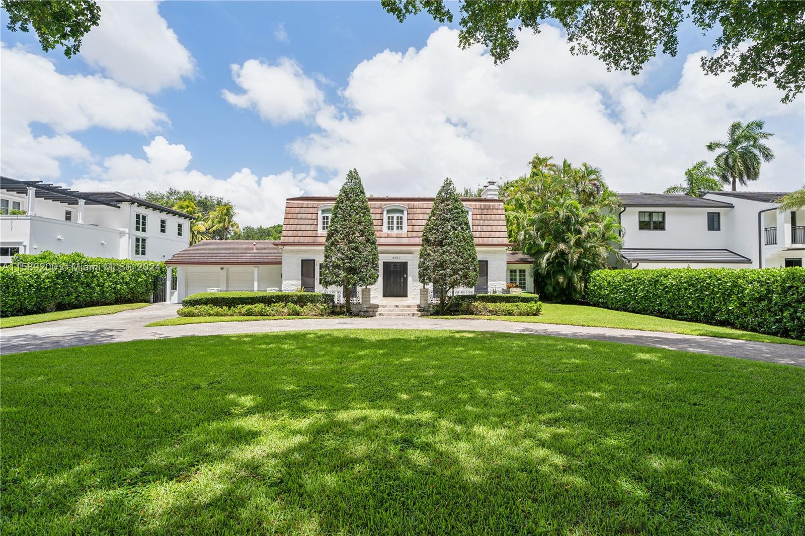 Introducing one of the few Dutch Colonial style homes of Coral Gables on prestigious Granada Blvd in the Golden Triangle of Coral Gables just steps from the Biltmore Hotel. This beautiful home exudes classic Coral Gables Charm with unique details and architectural elements of its time. A true Coral Gables Gem. Homes sits on a 14,007 sq ft lot in one of the most picturesque tree lined streets of the City Beautiful. Home is set back so it boasts a massive front with spacious driveway while still having a large backyard and one of the largest pools you'll find. Home was renovated in 2017 so many modern elements in this classic beauty Ex; high end appliances, impact windows and renovated bathrooms.