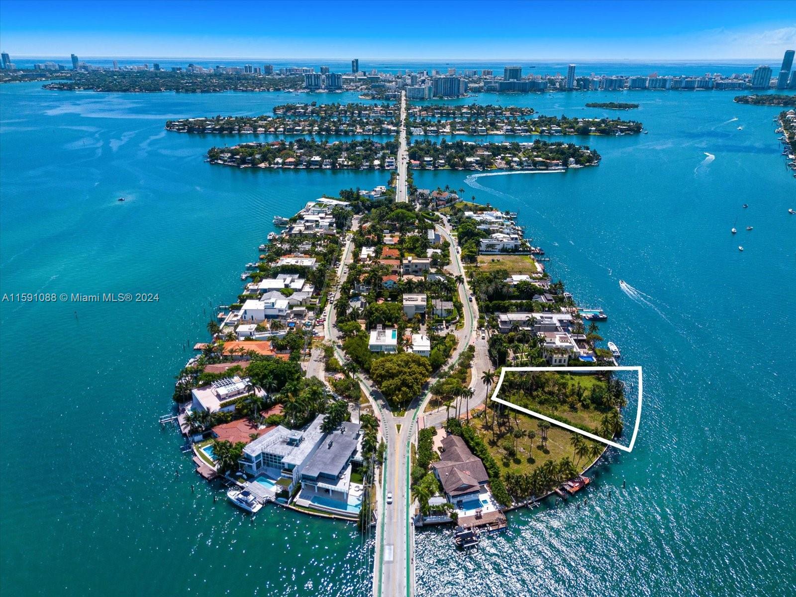 Stunning lot to build your dream home with 206 waterfront on Biscayne Bay with direct downtown sunset views. Prime location within the prestigious Venetian Islands, this remarkable vacant lot spans near 27,000 sq ft, making it one of the largest waterfront parcels available in Miami capable of yielding approx. 18,500 sq ft residence. Build higher with first floor at 15 ft NGVD and design an understory that will provide garage parking for over 12 luxury cars. The property sale includes approved and permitted plans for a beautiful home designed by Richard Landry. It will save buyers two years of time that it takes to design, review plans and get permits approved. With permitted plans ready for contractor to break ground you will save worth millions of dollars in development costs and time.
