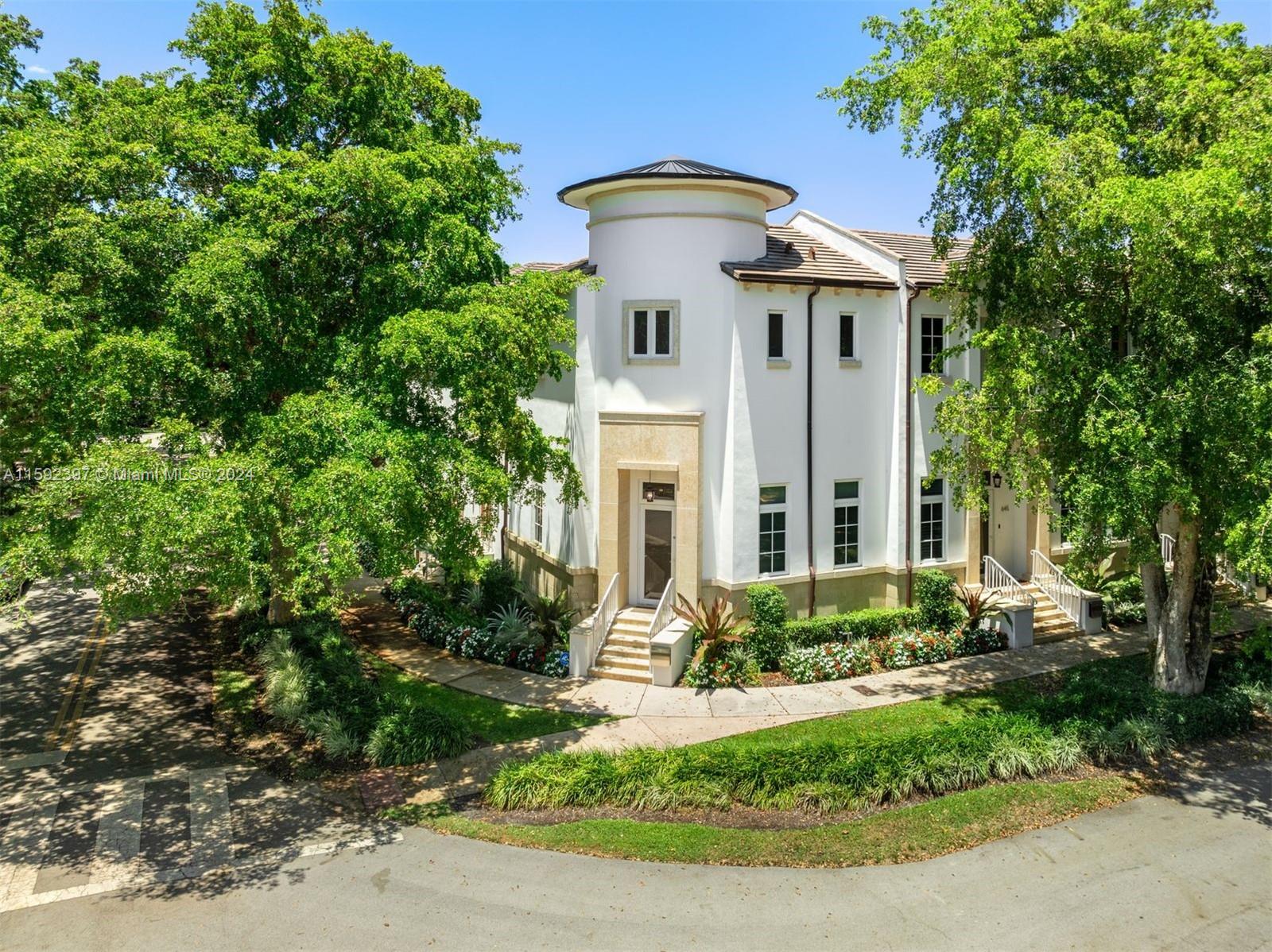 Unrivaled and only one! Imposing end unit villa standing tall and proud on the corner of Cardena St and Santander Ave. It features a private courtyard/patio with summer kitchen and embellished with fountain and landscaping. Some features include an ELEVATOR, a stunning kitchen with Italian cabinetry, high-grade appliances, impact windows/doors, volume ceilings and exquisite flooring throughout. Its rear entry 2-car garage is accessed via the gated entrance on Cardena Street. This luminous residence is nestled on a tree-lined street where walkability and bikeability is a way of life. Just a short distance to Venetian Pool, Library, Youth Center, Parks, golf courses, fine dining and numerous shoppes. A rare opportunity and not expected to last. [BUYER TO HONOR CURRENT LEASE THRU 2/28/2025]