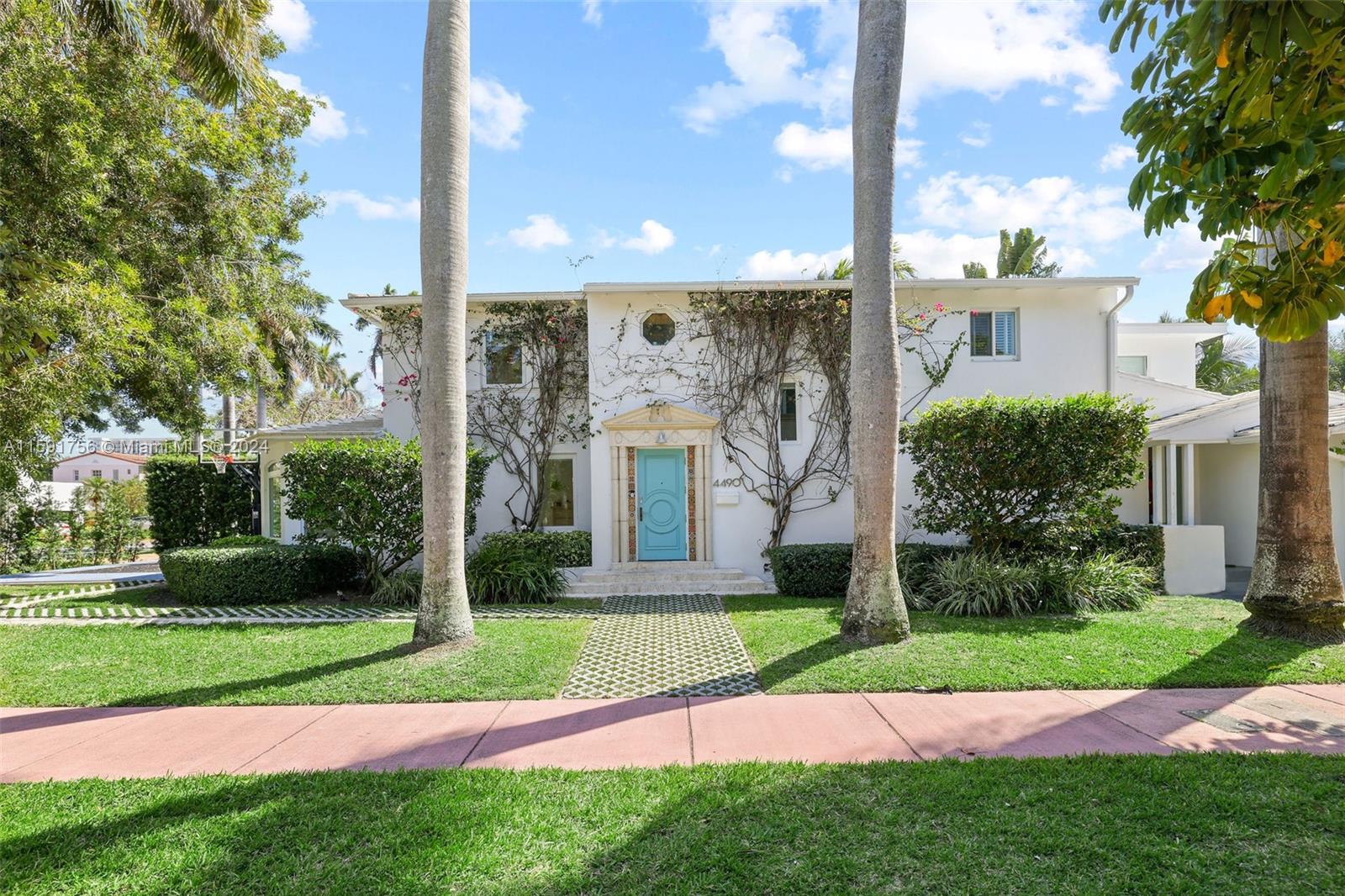 Step into luxury at this fully renovated, 2-story Miami Beach home, located on a stunning tree-lined street. This corner lot residence offers a perfect blend of elegance and convenience. Features include a grand marble fireplace, beautifully updated bathrooms, a large kitchen with modern cabinets, stainless steel appliances (including a wine refrigerator), original wood floors, and more. Outside, you'll find an expansive pool and yard area, along with a basketball court and an office space accessible via outside stairs, providing a versatile area for work or relaxation. With its close proximity to the shops and dining on 41st street, the beach, and easy access to the Design District, Downtown Miami, and the airport, this captivating home offers the best of Miami Beach living.