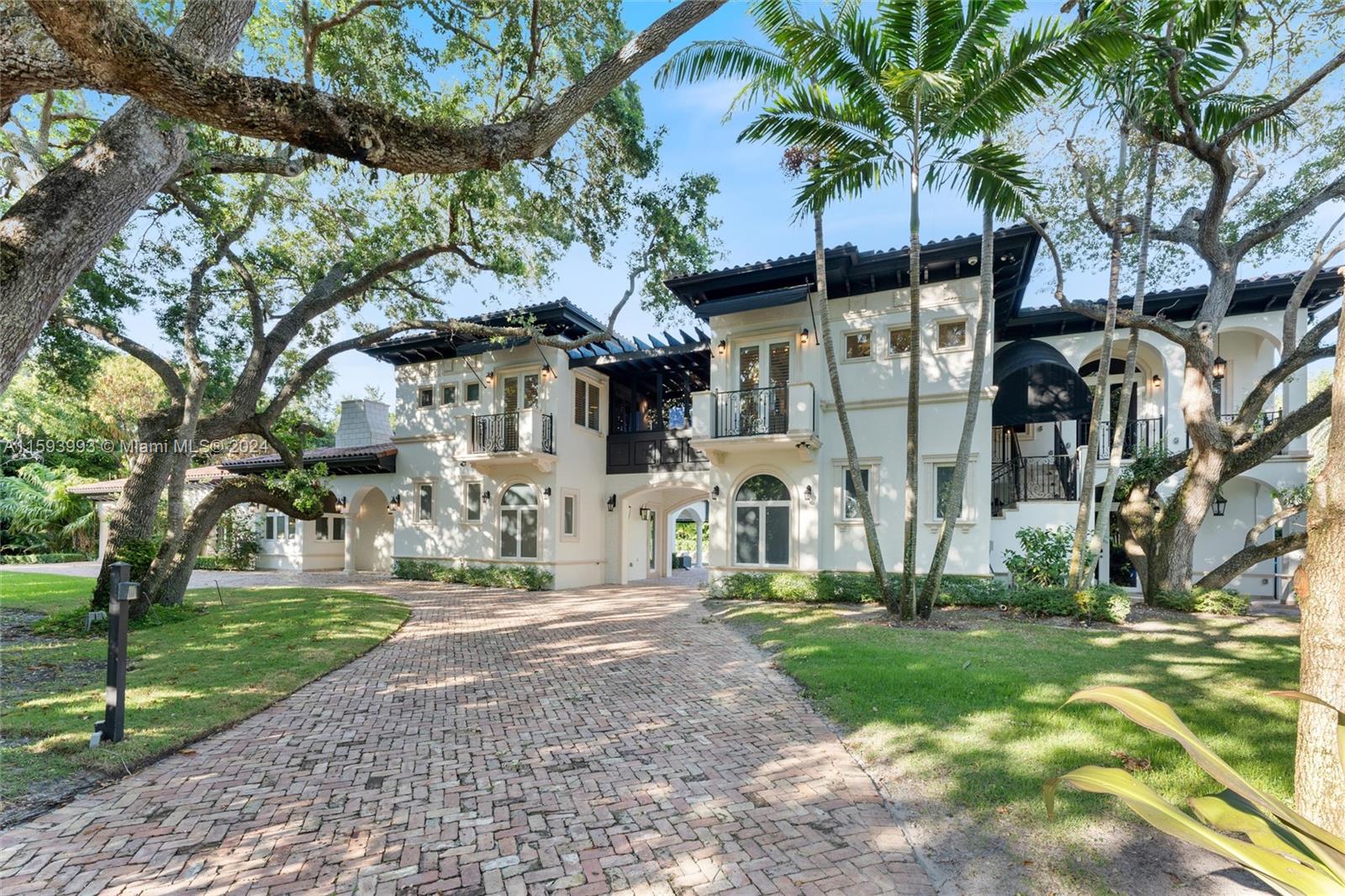 Spectacular, Vizcaya-style Pinecrest Estate commands a lushly planted builder’s acre on a quiet, tree-lined street. Flowing, sunlit interiors are simple, elegant, timeless; innovative layout ideal for entertaining. No-expense-spared materials, updates & artisan craftsmanship thruout. Sophisticated living area w/pop-out dining nook. Expansive, marble-appointed, eat-in chef’s kitchen w/Wolf, Sub-Zero & Miele appliances + adjacent laundry/pantry. 4 ensuite bdrms (2 primary: 1 poolside, 1 treetop). Outrageous entertainment suite w/glass floor, mega screen, wet bar, fireplace & more crowns the 4-car garage below. Exterior: pickleball/b-ball court w/stadium lighting, lge pool, grandly scaled covered terrace/summer kitchen & big bar. Live & recreate luxuriously in this unique, MUST-SEE residence!
