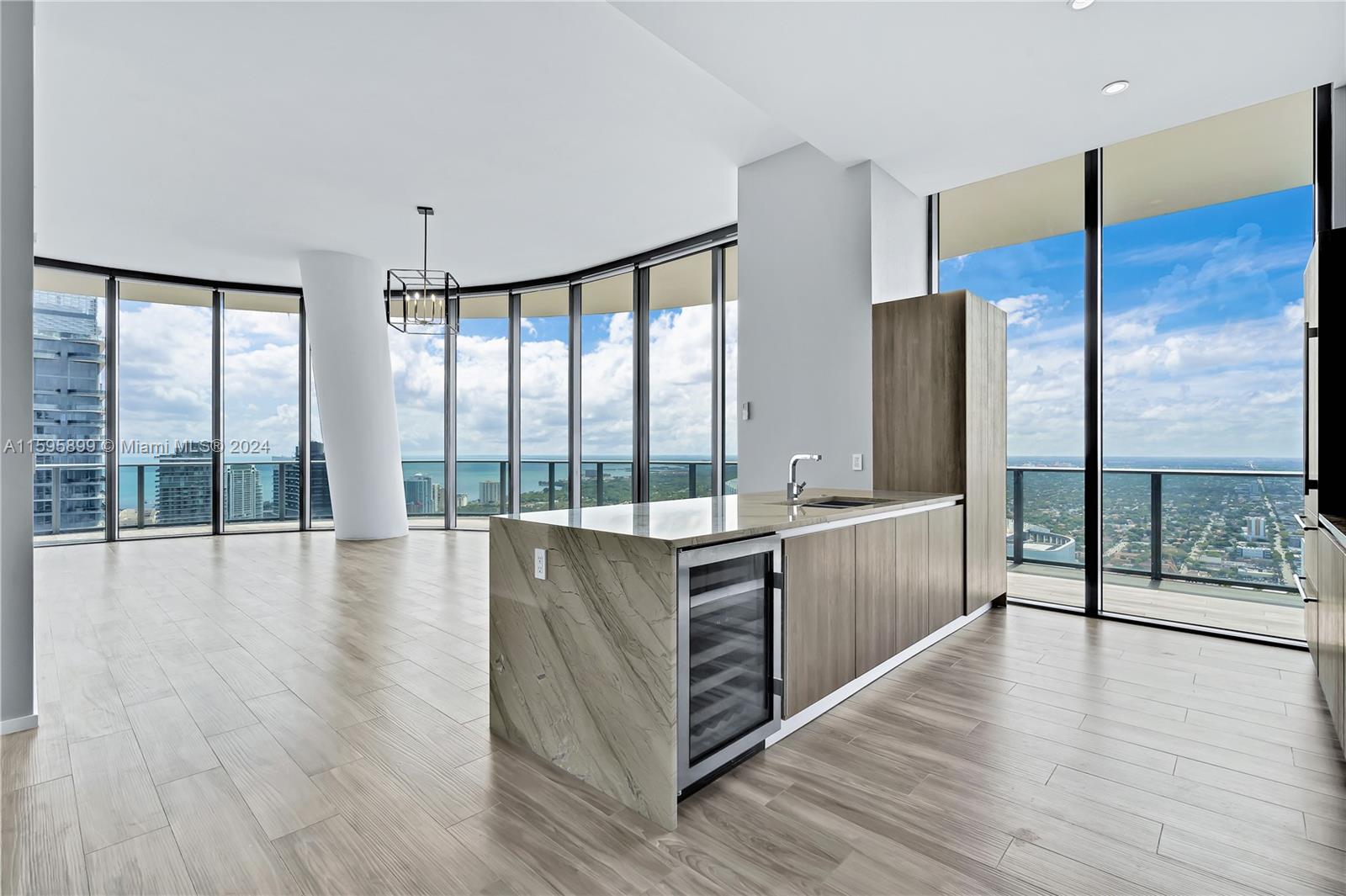 SLS LUX PH with skyline views. Floor to ceiling windows throughout with 12 Ft celling. This 3 bed 3.5 bath is the perfect residence to live in. Includes a private elevator w/biometrics technology. The amenities include SLS LUX Spa & room service from the Katsuya restaurant/bar, access to the 58th level rooftop & pool ,two-story Cava lounge, Jacuzzi, Tennis court, rock-climbing wall, basketball court & full service fitness center. Living at SLS Lux allows you to live in complete luxury and have access to world class amenities & services.