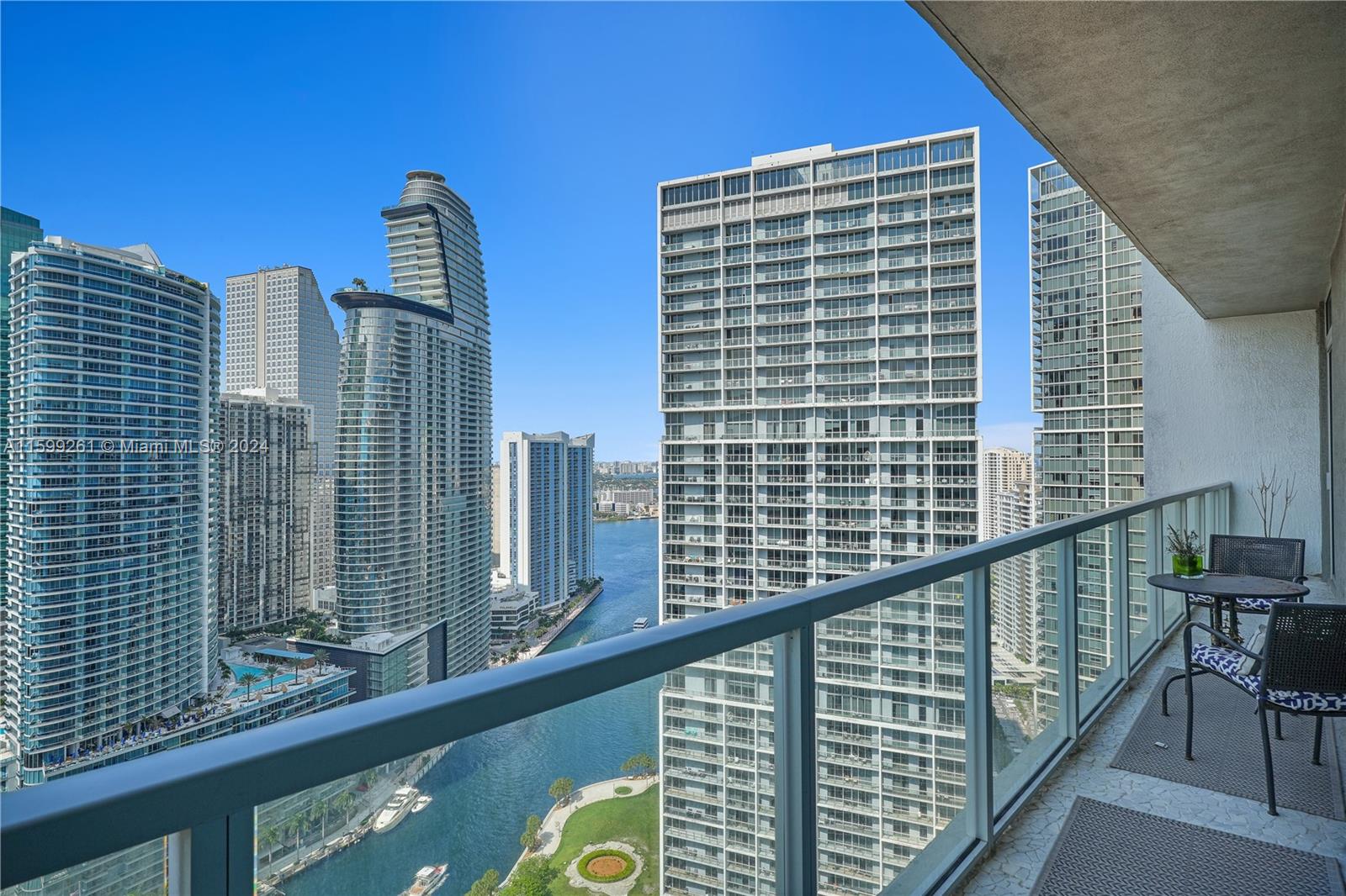 Come see this Spectacular Lower Penthouse with Extra High Ceilings and Windows. White large tiles, Custom built-in drop-ceilings with built in lighting, Resurfaced Kitchen cabinets, Updated shower, Built out Custom Closets & Motorized shades on all windows. Unit faces the mouth of the Miami River leading to Biscayne Bay, which the Water can be seen from all the rooms. The development is located right on Brickell Ave. Cafes, Restaurants, Bars, Salon, Dry Cleaners, Banks, etc just downstairs in retail space of the bldg.seller willing to carry back mortgage at 5%. Amenities include 2 Pools, Large Gym, Spa, Movie Theatre, Billiards, Party Rooms, 24 HR Doorman & Business Center. 1)