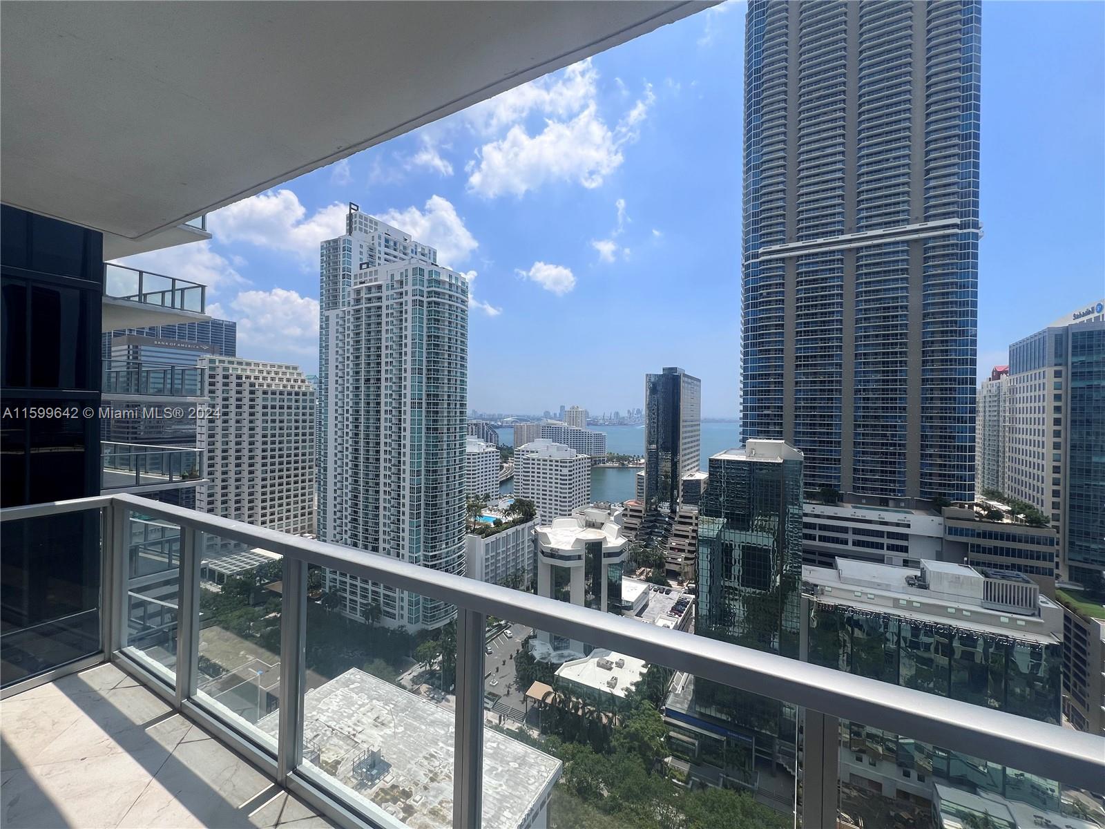 Large 1 bedroom 1 bathroom, corner unit with direct bay views and 1 assigned parking!!!! in the heart of Brickell next to restaurants, shopping center, and bars. Easy to show!!!!