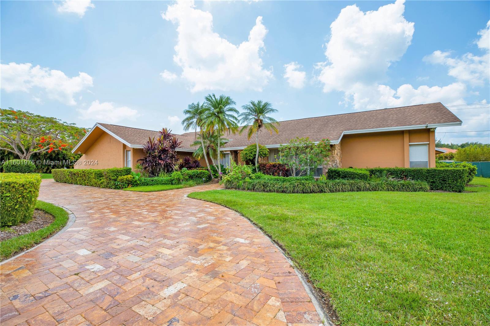 Welcome to this six-bedroom estate situated at the end of a quiet cul-de-sac on an oversized lot in Palmetto Bay. Meticulously maintained, this home projects true pride in ownership. 

Step inside to find a spacious floor plan with an impressive four-car garage. A one-of-a-kind grand master suite boasts a private office and sauna. 

The outdoor screened patio features a large pool and spa, perfect for enjoying the Florida weather year-round. A large driveway provides ample space for guests, making this home ideal for entertaining. The community offers tennis, pickleball, and basketball courts with a very low voluntary HOA.