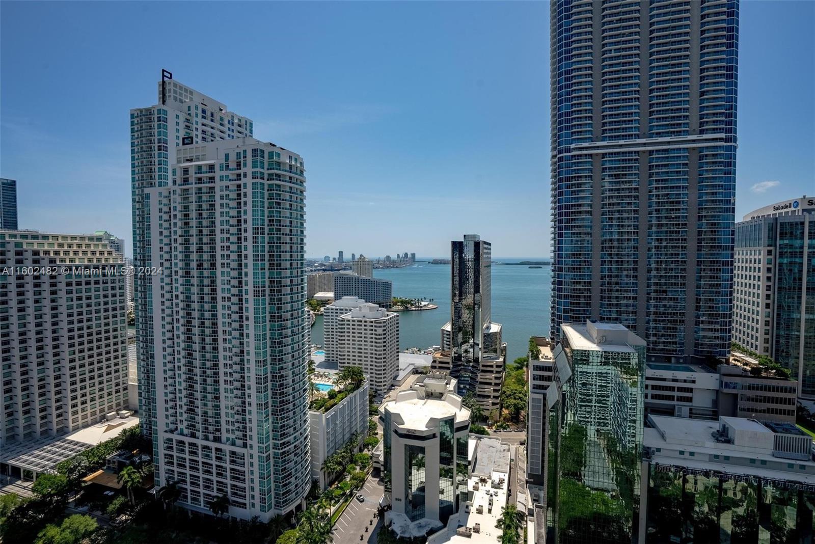 Luxuriously UPGRADED unit at the top-of-the line; 1010 Brickell. Featuring 2 beds, 3 baths + DEN, which can be easily converted into a 3rd bedroom, porcelain tiles, 2 parking spaces & 1 STORAGE SPACE, Electric window treatments, 9-foot ceiling heights, LARGE BALCONY W/SPECTACULAR VIEWS OF THE BRICKELL skyline and BAY, PRIVATE ELEVATOR! Enjoy your life in this luxury building with an outdoor movie theatre, restaurant & swimming pool at 50th floor rooftop; Co-ed Hammam spa w/ cold & hot Jacuzzi, massage & treatment rooms, sauna & steam room, basketball & squash courts, indoor heated swimming pool, fitness center, yoga room, running track, indoor kids playground, party room, kids room w/bowling, virtual golf simulator. Excellent location next to Publix, Brickell City Center and more!