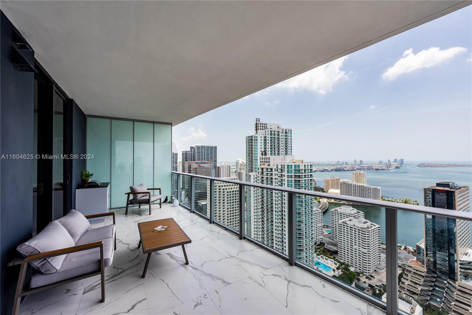 Spectacular brand new upgraded corner unit at the iconic 1010 Brickell Condo. Professionally furnished apartment, 4 beds (enclosed den), 3 baths, private elevator, 9-foot ceiling heights, balcony with bbq/summer kitchen & stunning views, top of the line Smeg appliances! Building offers: outdoor movie theatre, restaurant & swimming pool @ 50th floor roof top; Co-ed Hammam spa w cold & hot Jacuzzi, massage & treatments rooms, sauna & steam room; basketball & racquetball courts, running track, indoor heated swimming pool, fitness center, party room w kitchen, open terrace & barbeque, kids room w bowling, virtual golf, among others. Excellent location next to public transportation, Brickell City Centre, & more.