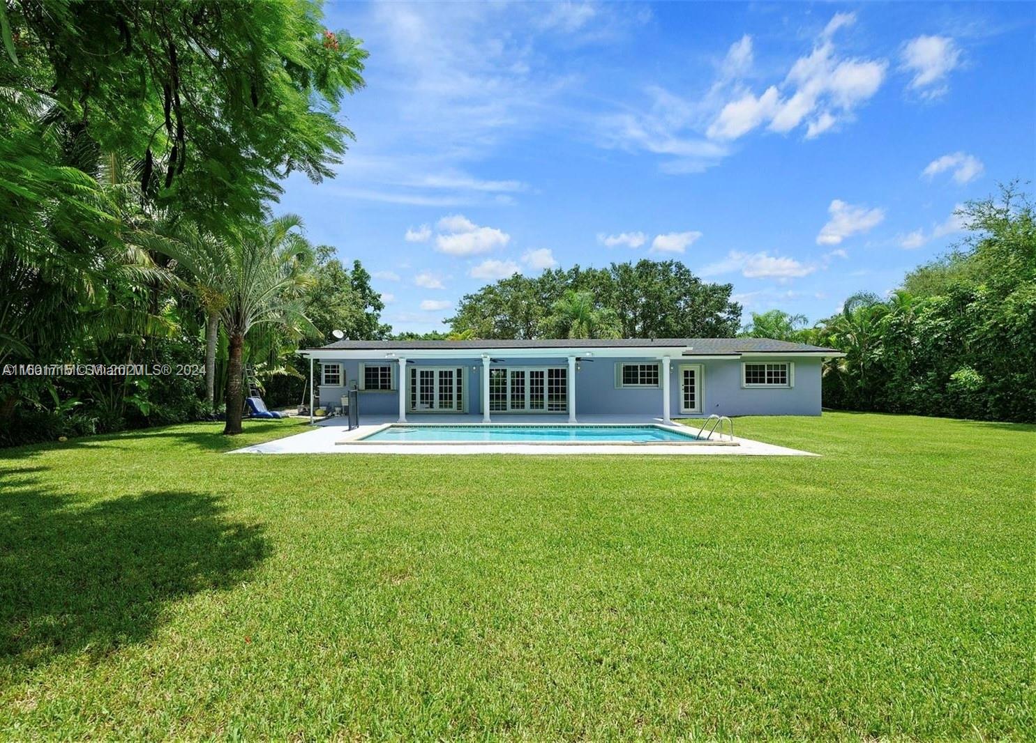 Nestled in the heart of the highly sought-after Palmetto Bay neighborhood, this beautiful 4/2 home sits on a spacious 15,984 sq ft lot. House comes with a 220V Electric car charger. Boasting A-plus schools just around the corner, this residence is ideal for families seeking top-tier education in a vibrant community. Enjoy a large remodeled kitchen with fairly new stainless steel appliances and granite countertops, elegant wood and travertine floors, remodeled bathrooms, and custom built-in closets. A/C is only two years old and well maintained. The backyard features a beautiful heated pool, perfect for relaxing or entertaining.