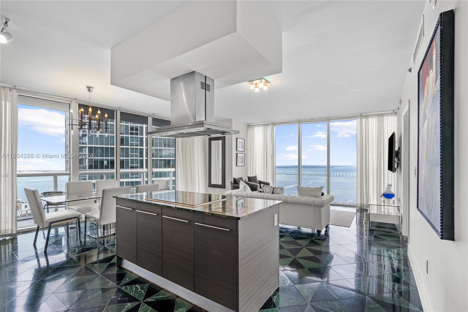 Discover luxury living in this stunning corner unit at W ICON TOWER, offering 2 Bed /2-baths with breathtaking views of the Bay, Ocean, River and City. Approved for short-term rentals, including Airbnb, this residence is perfect for investors seeking prime real estate. Designed by the famous Kelly Wearstler, this unit in Icon Brickell building 3 features premium amenities and stylish interiors. The property includes top of the line Subzero and Wolf appliances an owner's closet and comes fully furnished, providing rental flexibility when not in use. Located near Brickell City Center, you'll have access to top dining and shopping destinations like Cipriani and Cantina la 20. This unit epitomizes luxury and represents the pinnacle of Brickell living.
