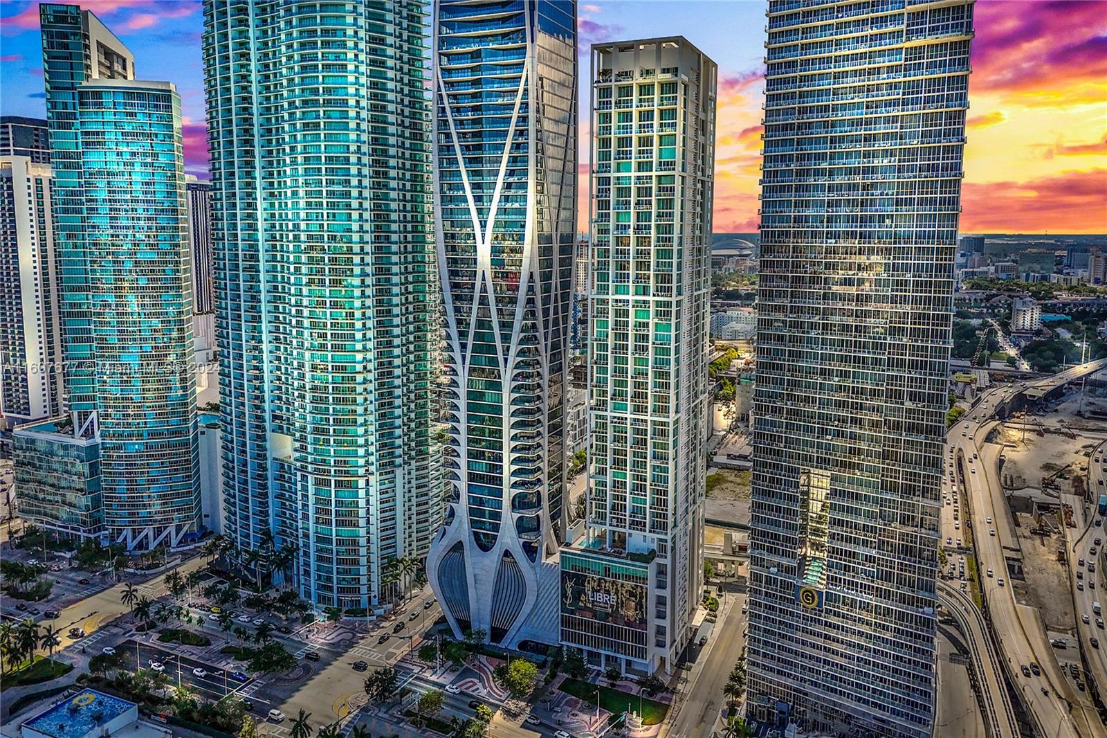Newly renovated high-floor luxury loft at T. M P. Positioned on the 38th floor, this 2/ 2.5-bath residence spans 1,802 S. F. W/ 20-foot ceilings. Revel in breathtaking panoramic views of the Atlantic Ocean, Biscayne Bay, South Beach, and the vibrant downtown skyline—all from the comfort of your own home.
Newly renovated, this unit features porcelain flooring throughout, new kitchen island, pantry, and den. The master suite is enclosed with floor-to-ceiling glass, brand-new spa like shower, and complemented by a spacious walk-in closet.
Ten Museum Park epitomizes full-service luxury living. Residents enjoy access to five swimming pools, a state-of-the-art gym, the renowned Clinique La Prairie Spa, and exclusive membership to a private south of fifth beach club.